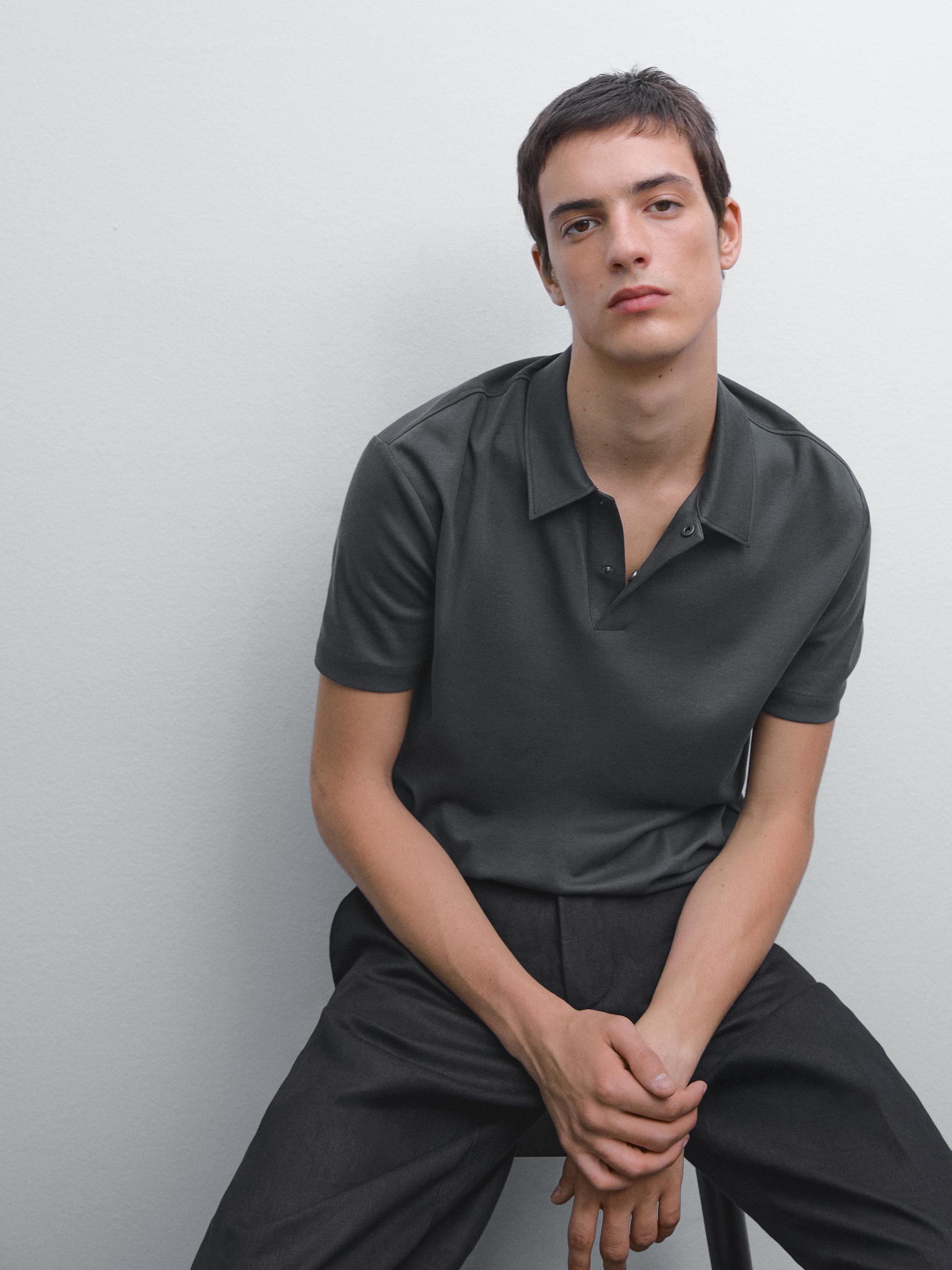 Short sleeve polo shirt with snap-button placket