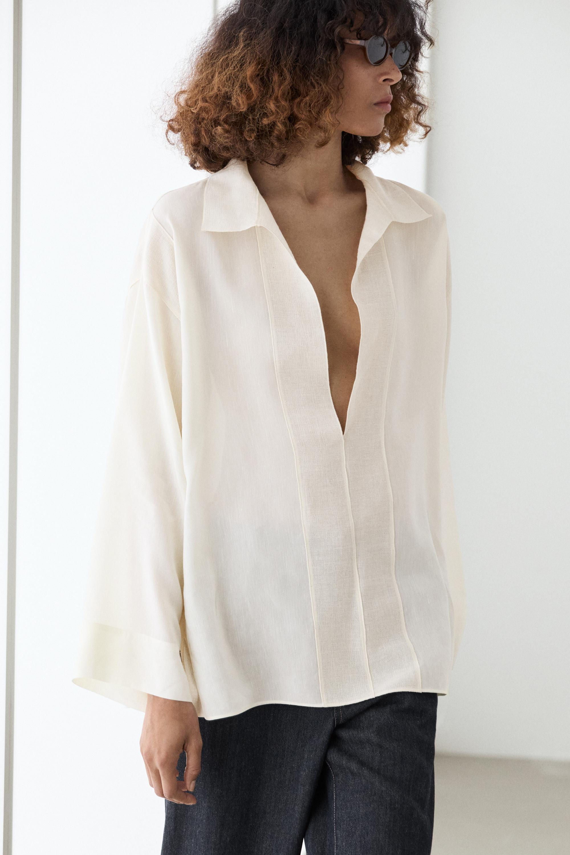 Flowing blouse with seam details — CREAM