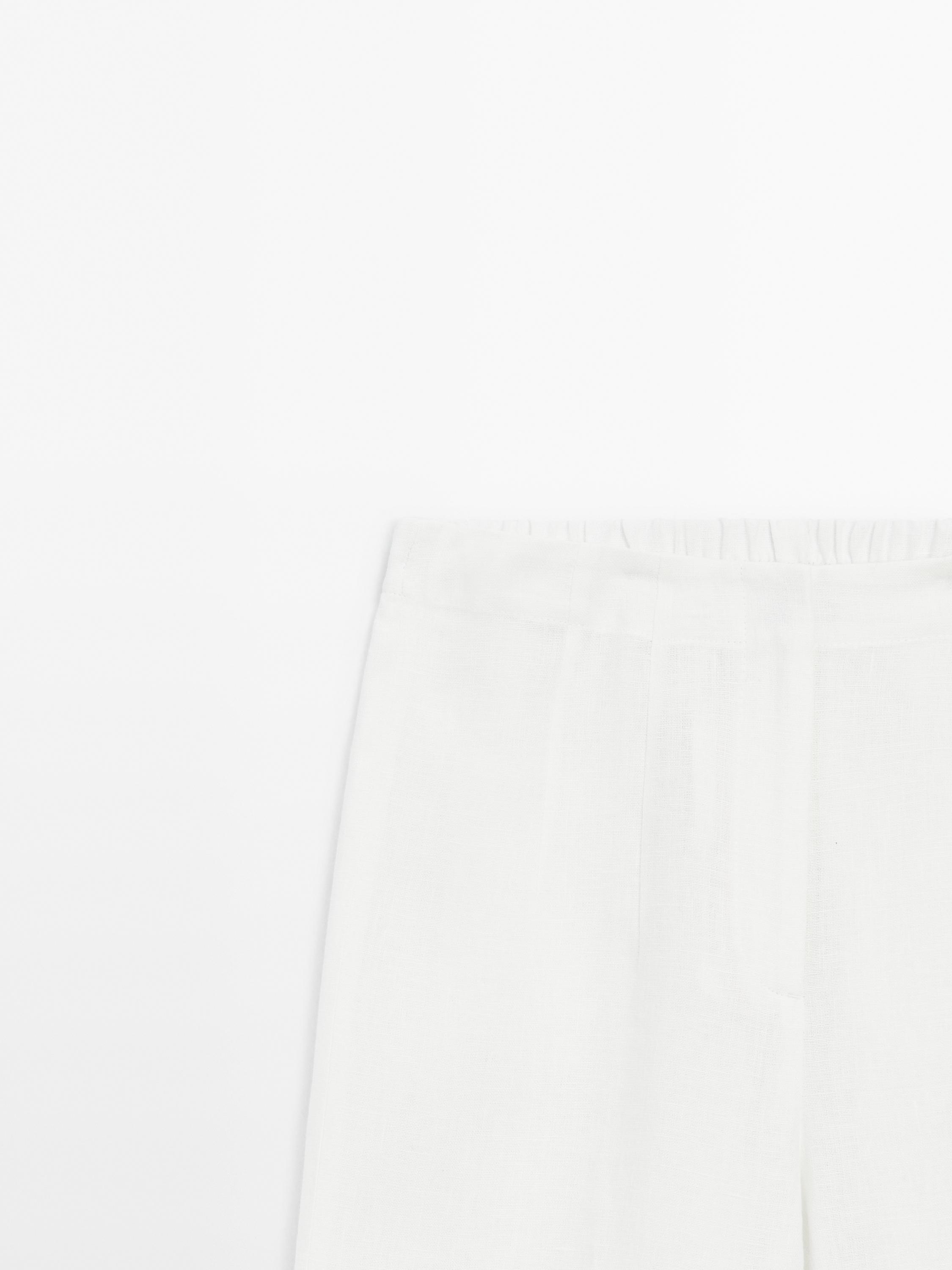Wide leg trousers with flared detail
