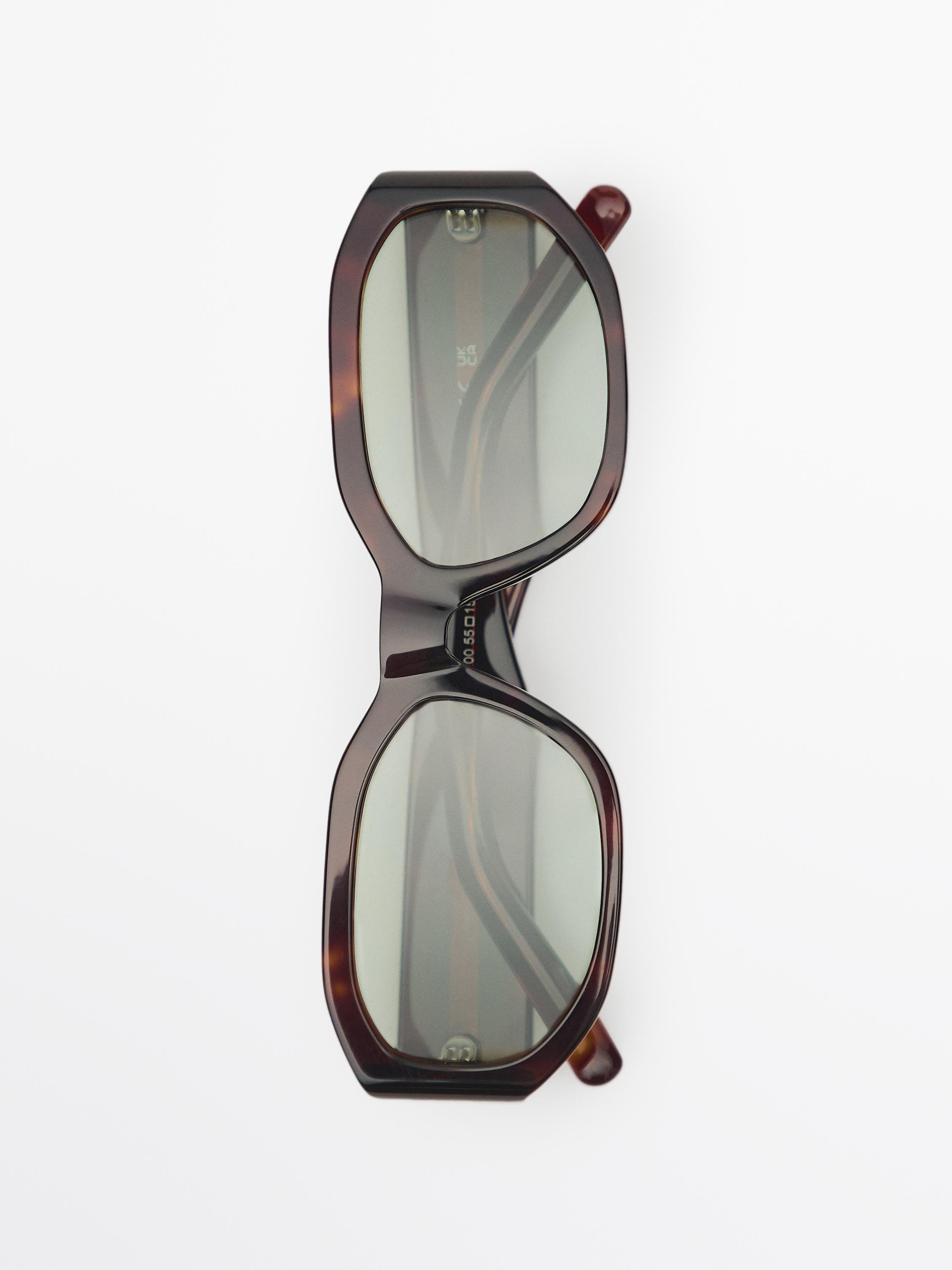 Small elongated sunglasses