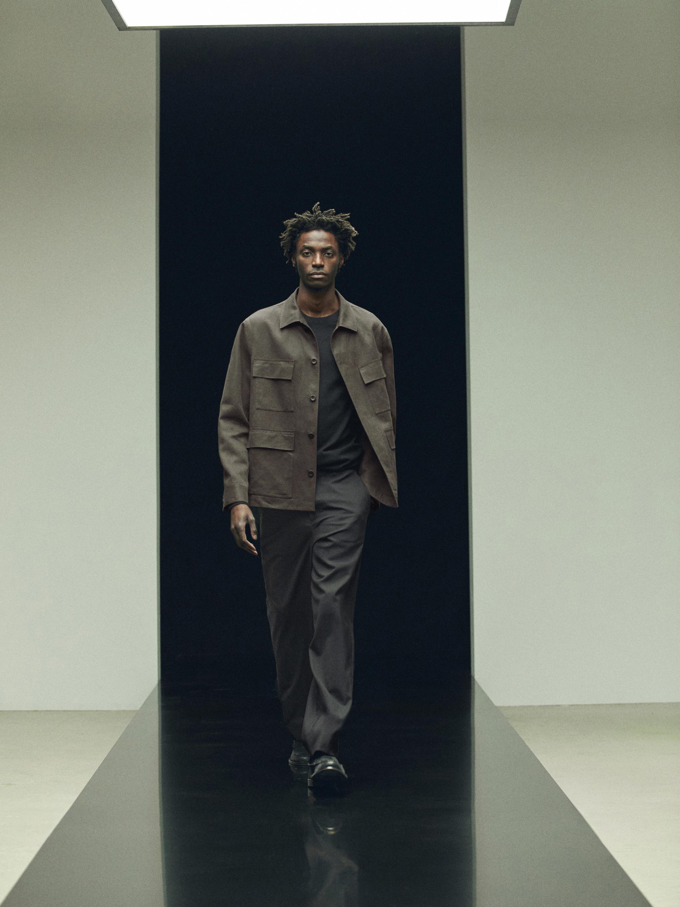 Dark khaki overshirt set with front pockets and matching pants.