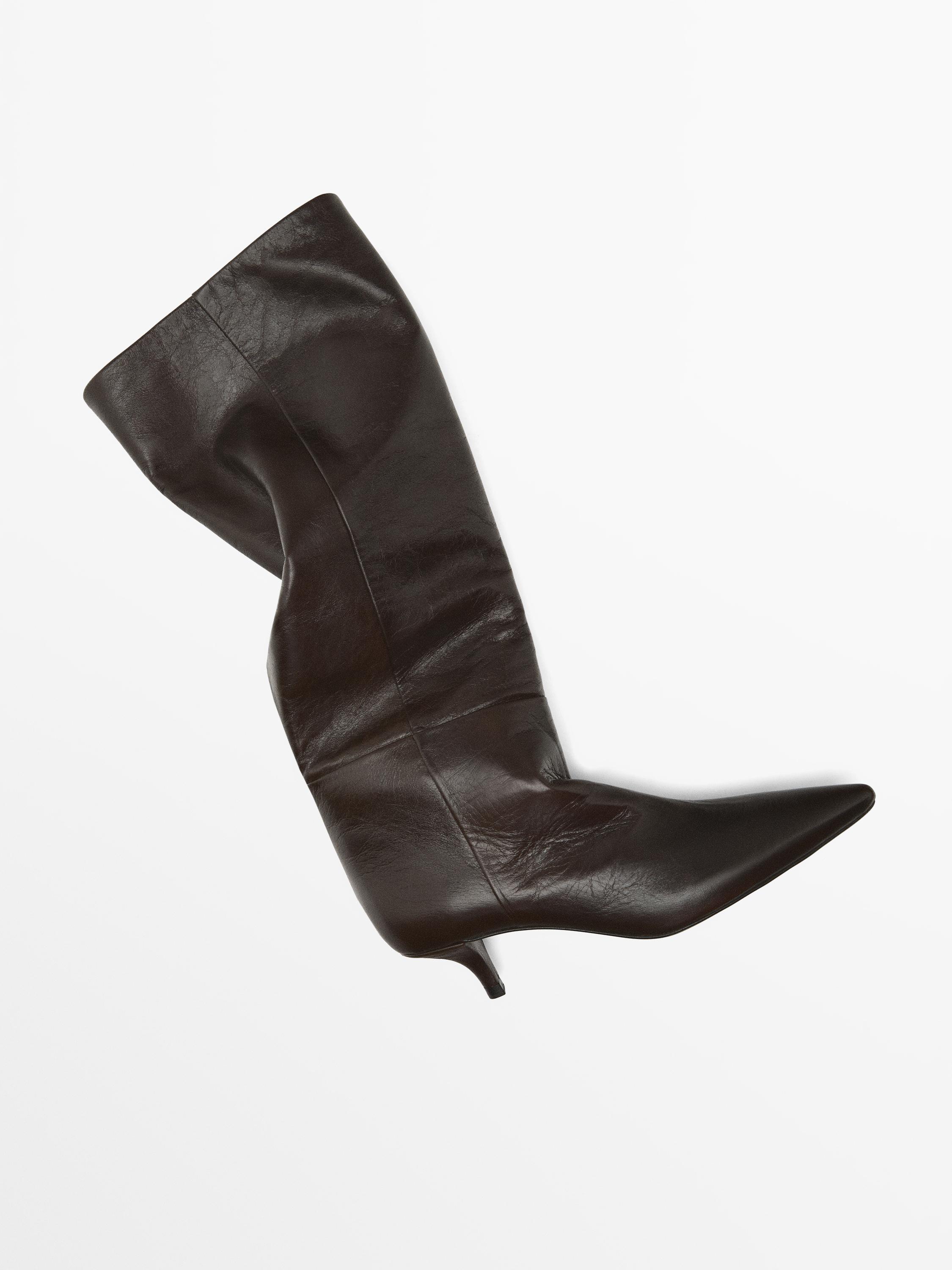 Heeled leather boots