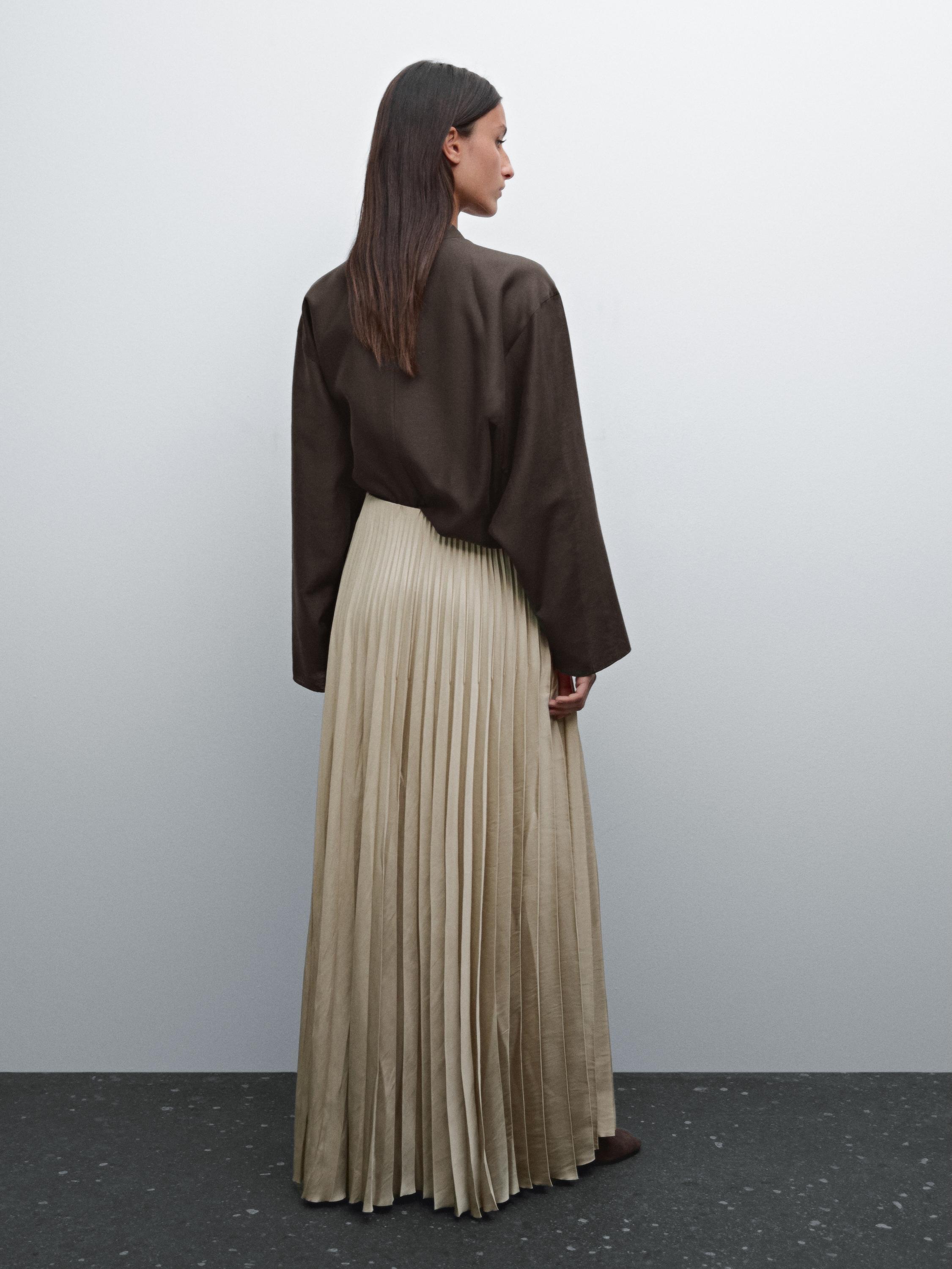 Flowing pleated satin skirt