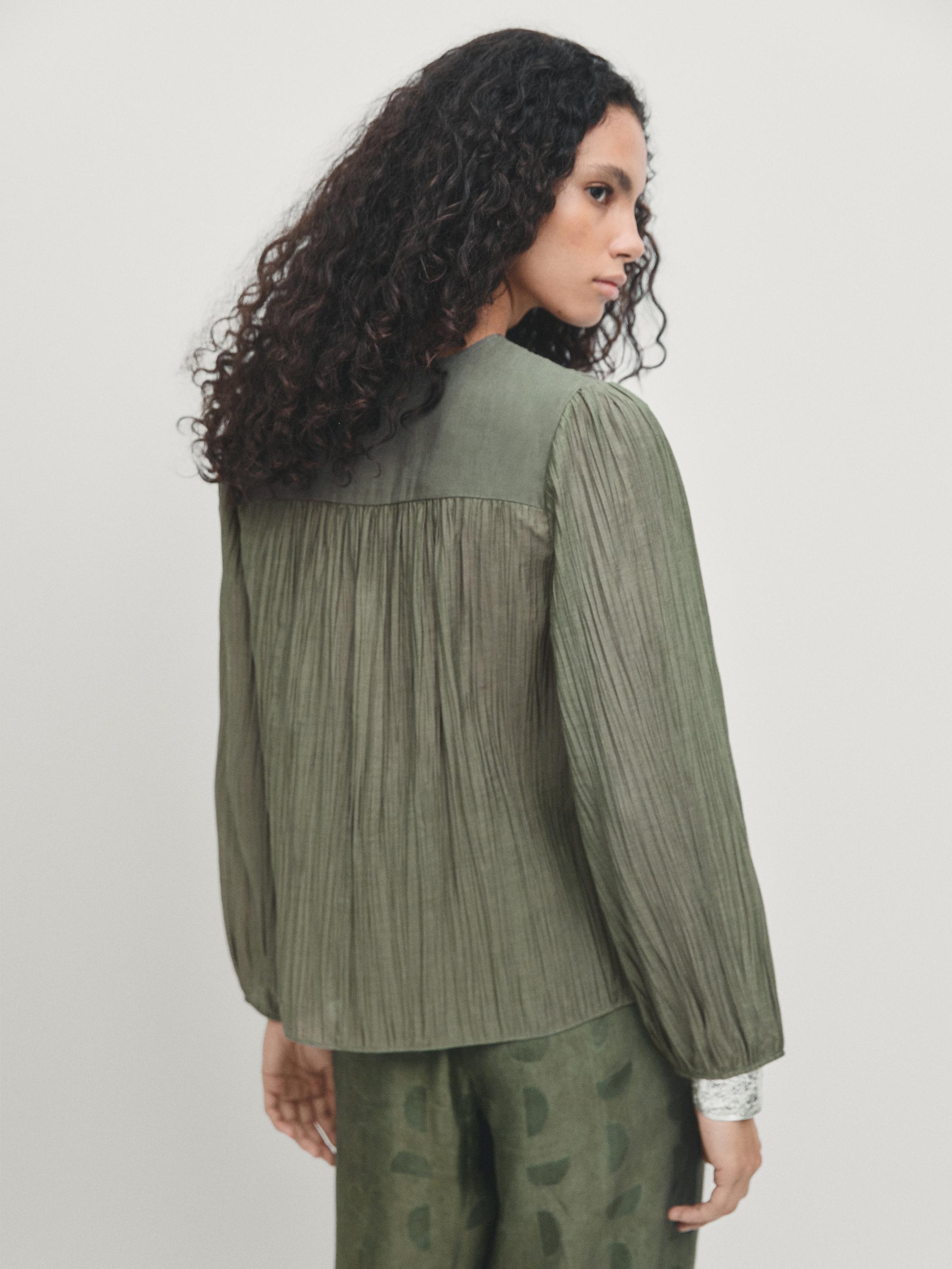 بلوزة بليسيه بحزام كورسيه