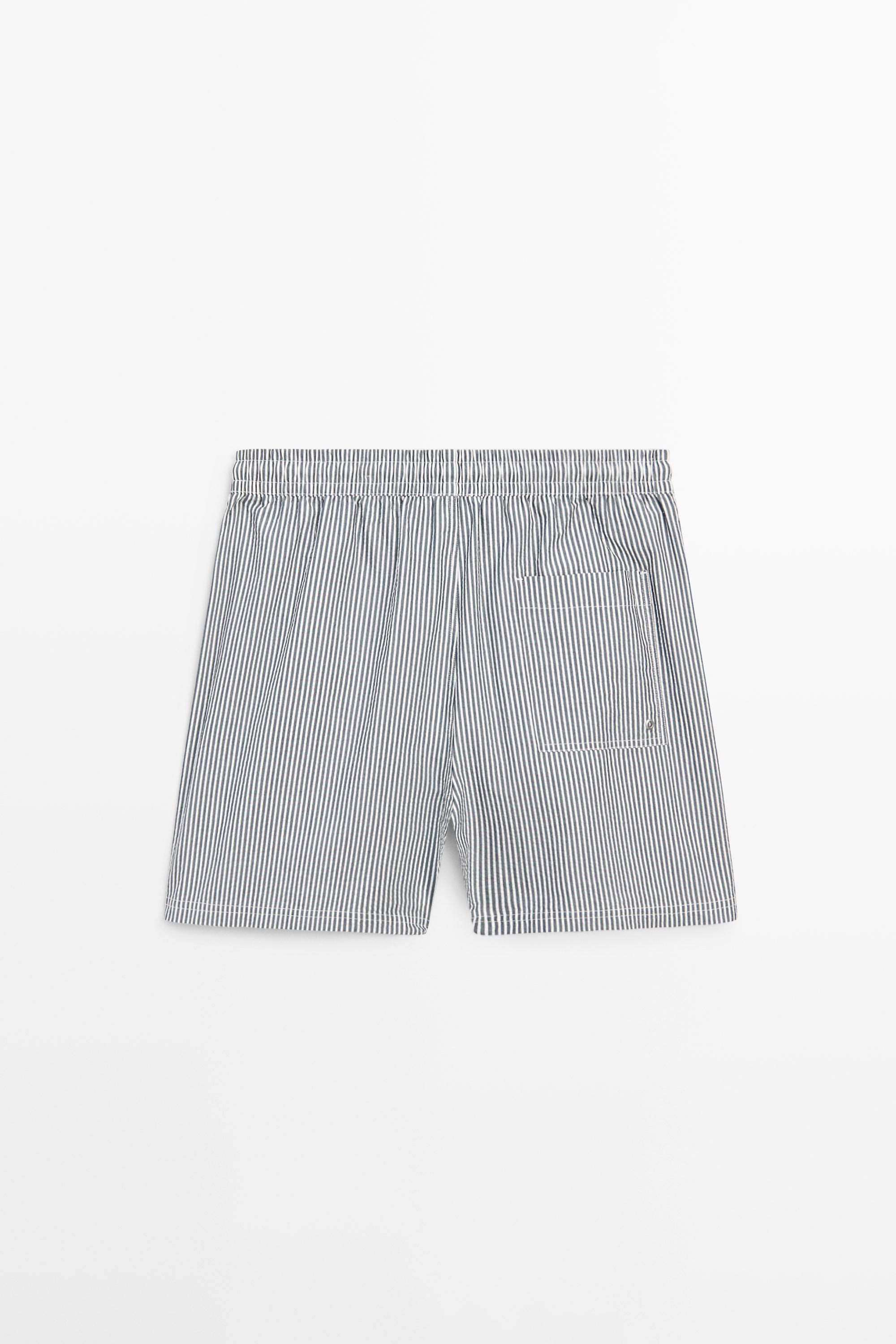 Swimming trunks with striped details — NAVY BLUE