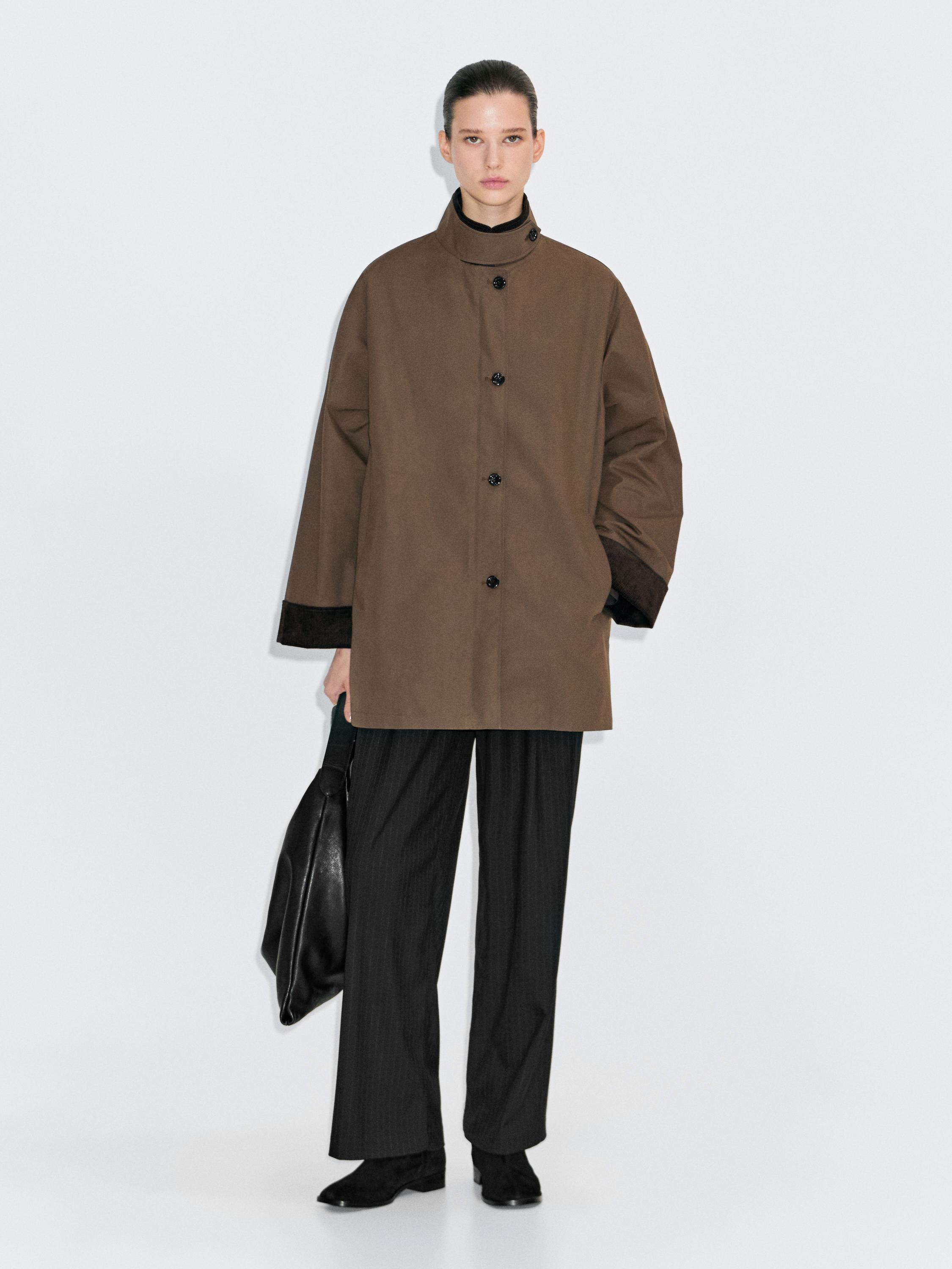 Waxed high neck parka with corduroy detail