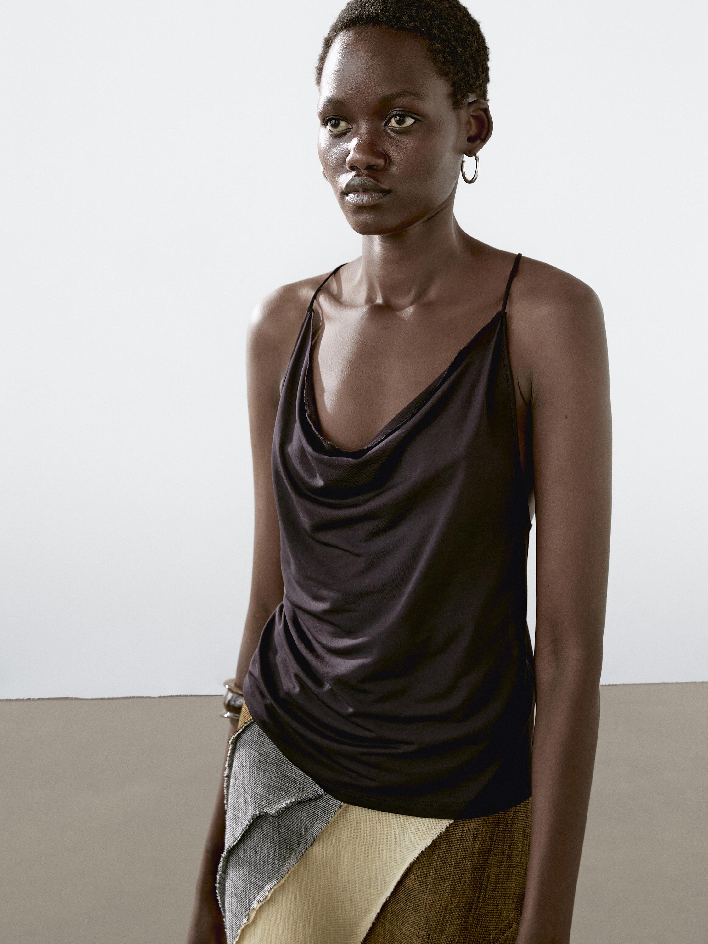 Flowing strappy top with crossover back