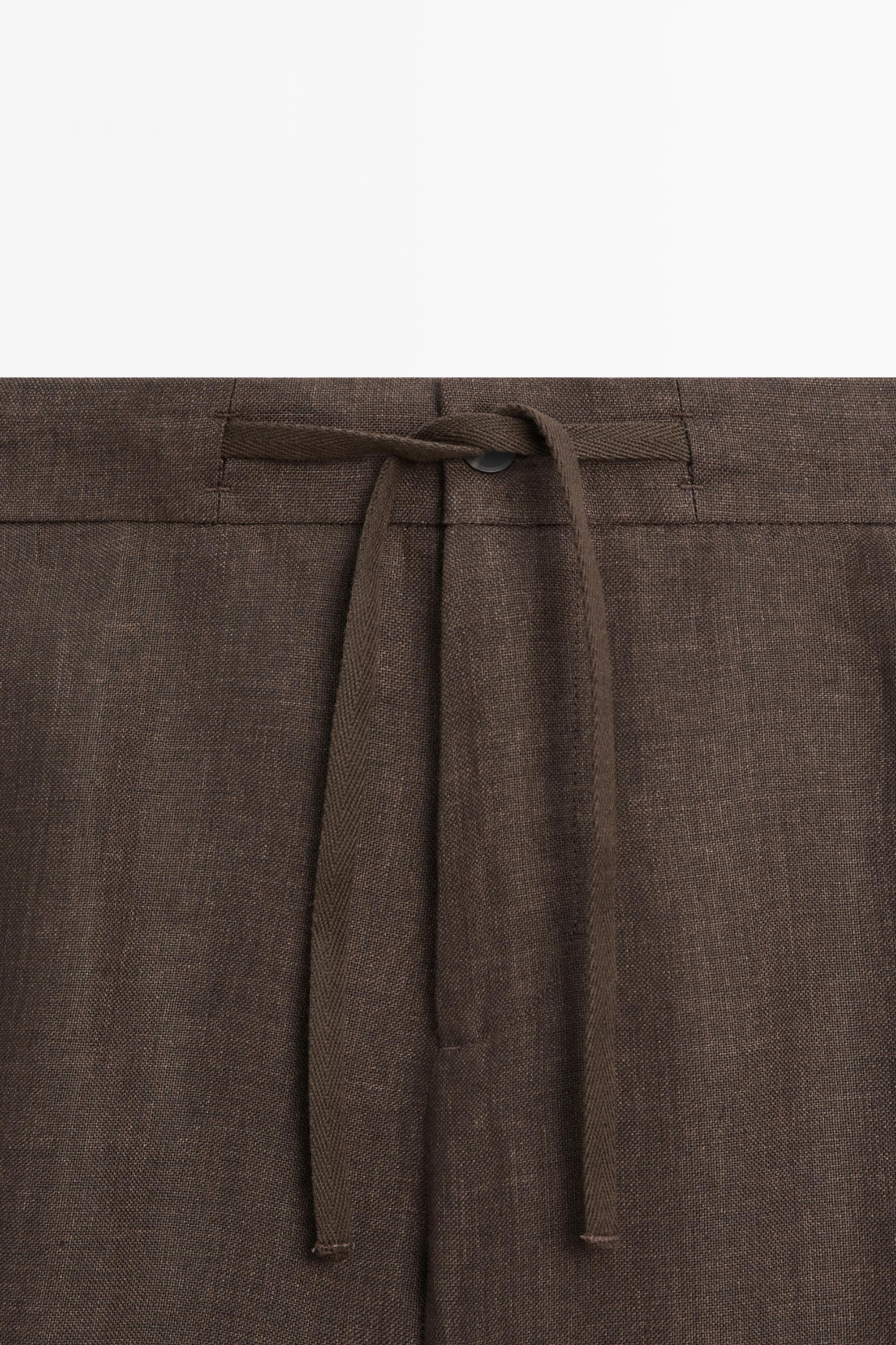 Faded total look linen trousers — OCHRE