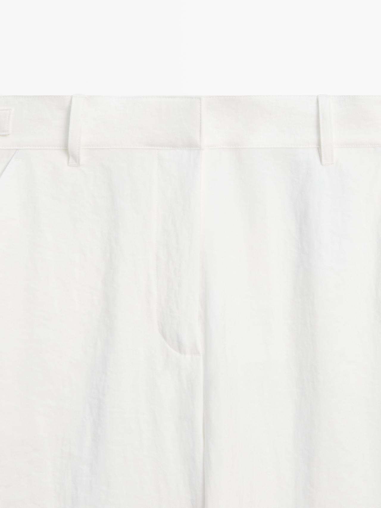 Flowing trousers with buckles — WHITE