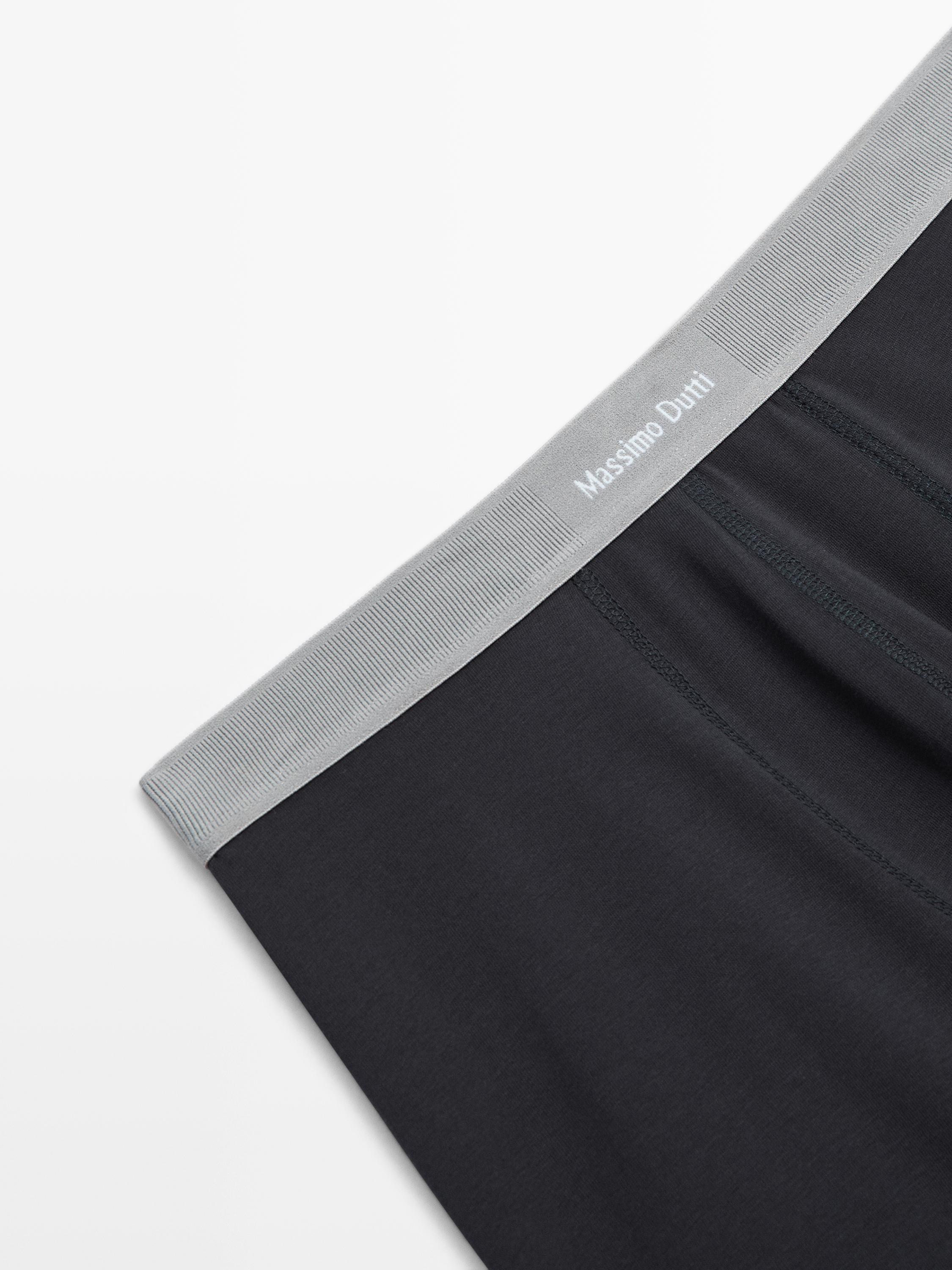 Трусы-боксеры с логотипом на поясе