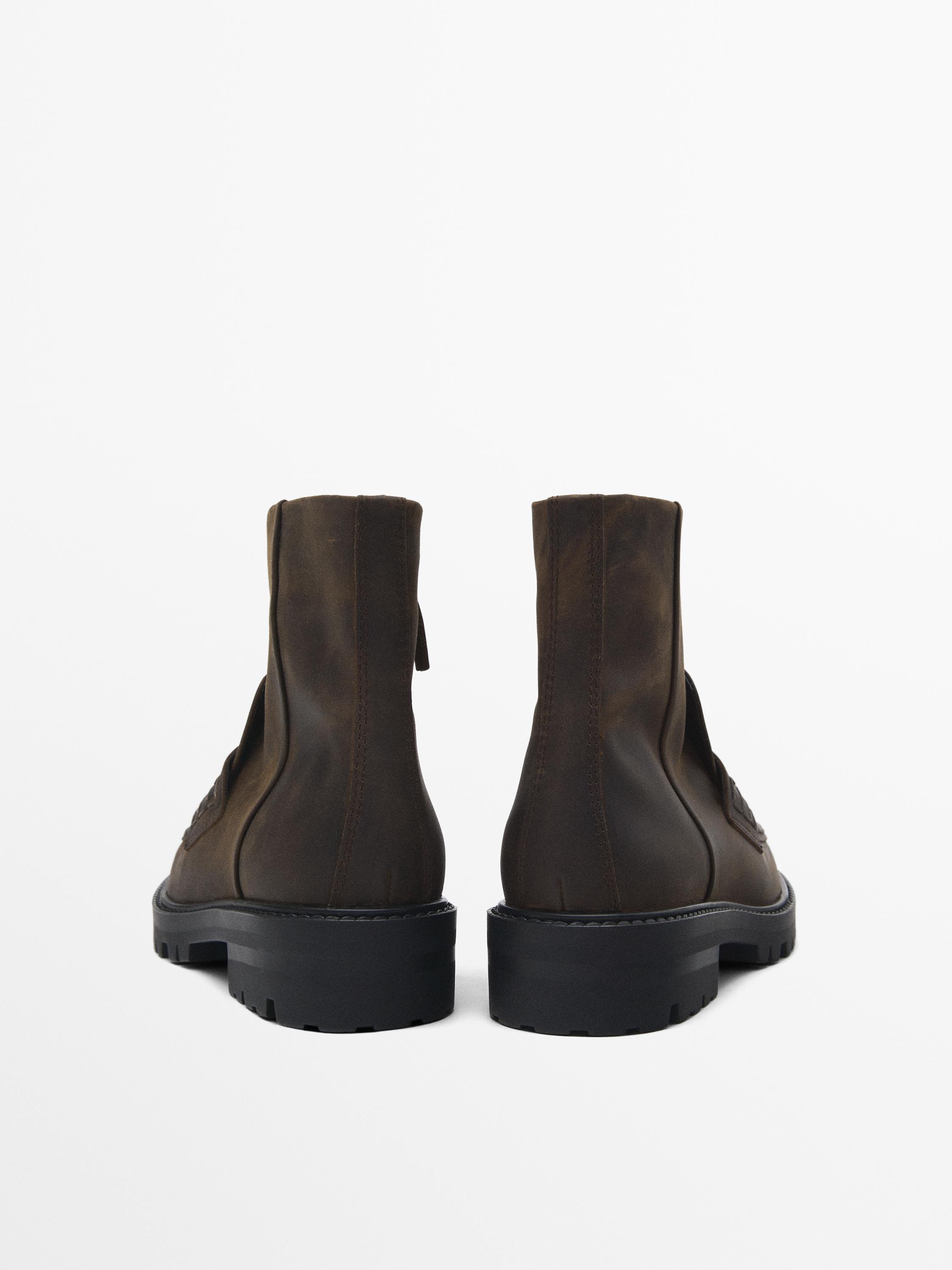 Track sole ankle boots with penny strap