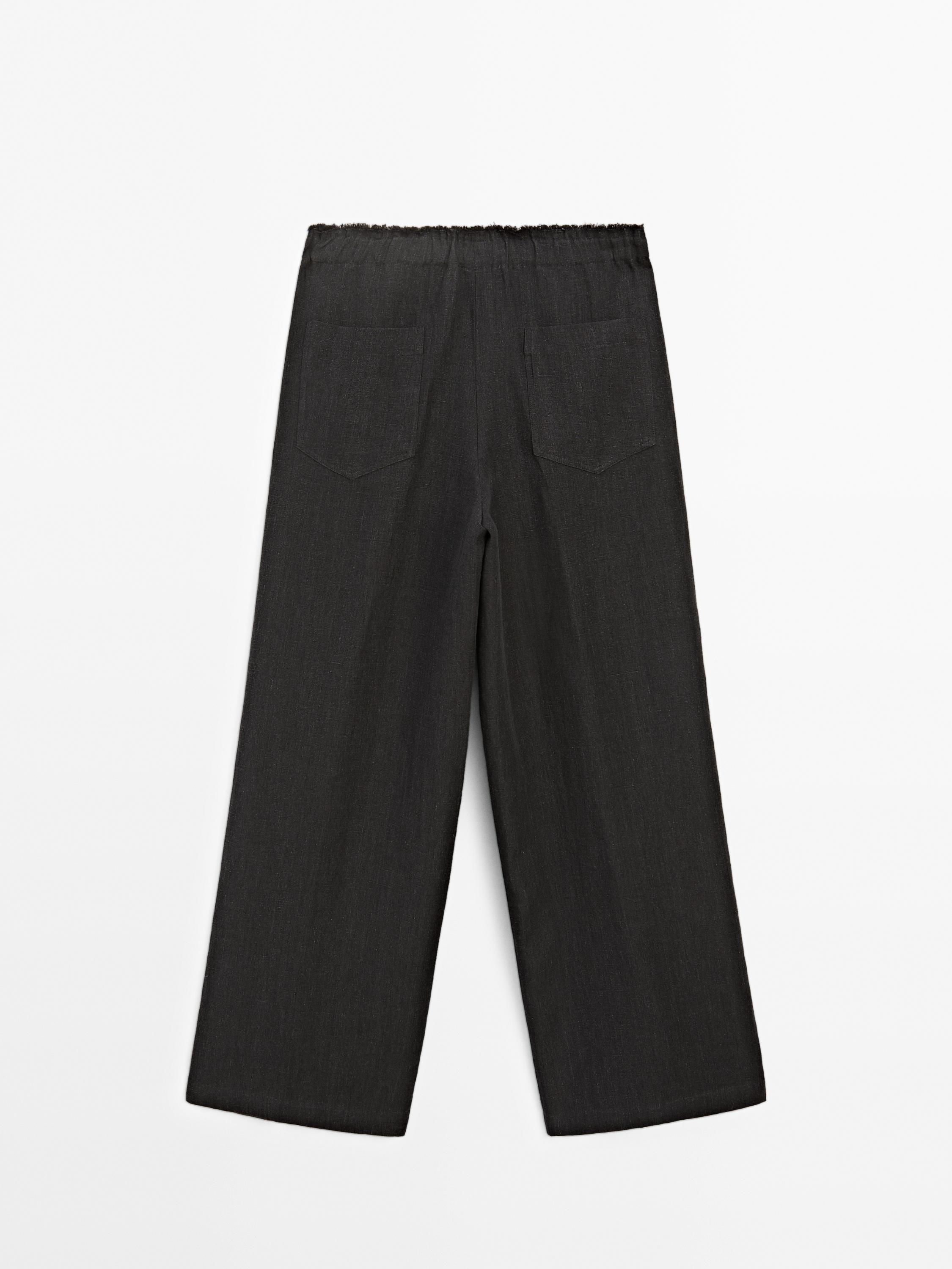 Linen suit trousers with frayed detail