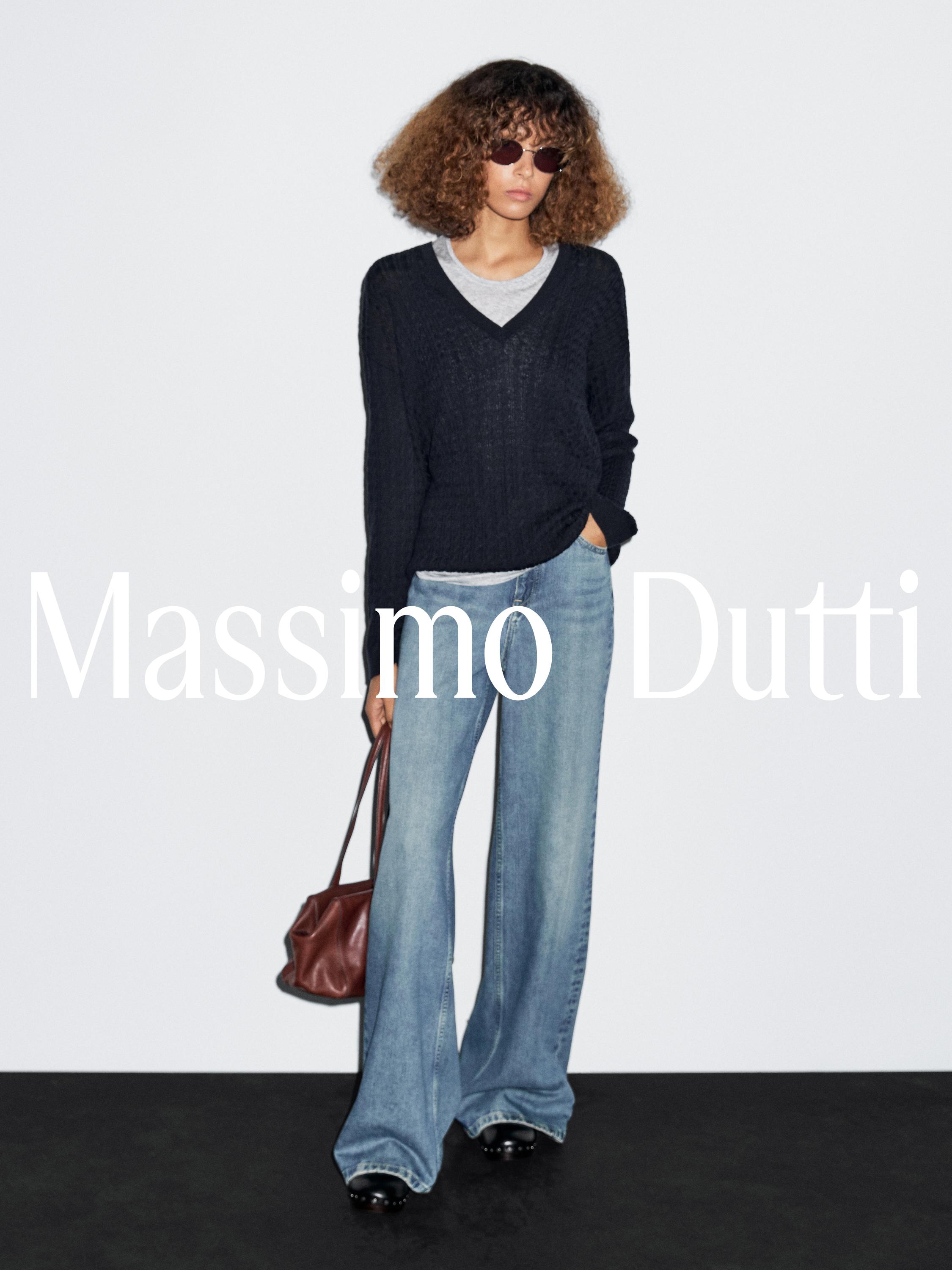 Maglia a trecce con scollo a v