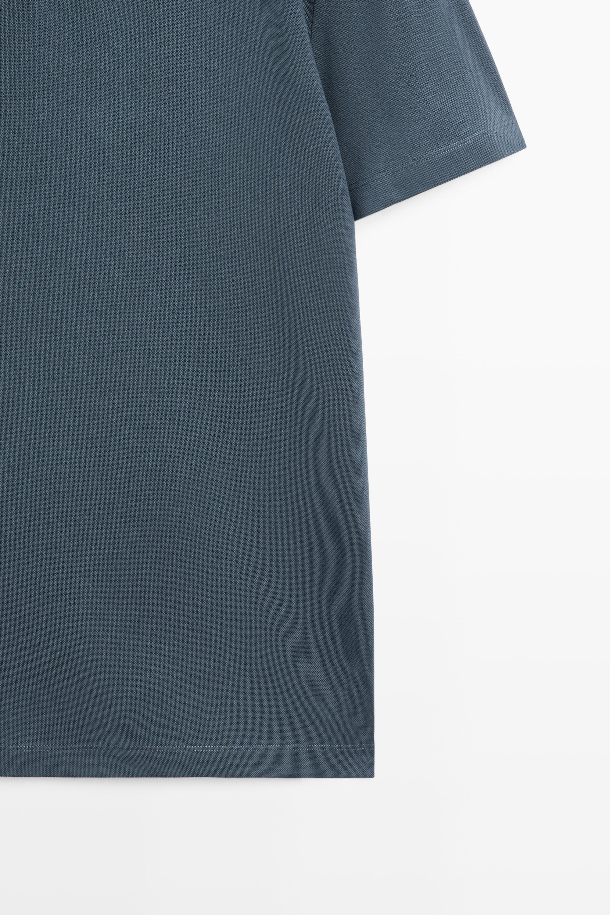 Micro-textured V-neck piqué polo shirt — DARK BLUE