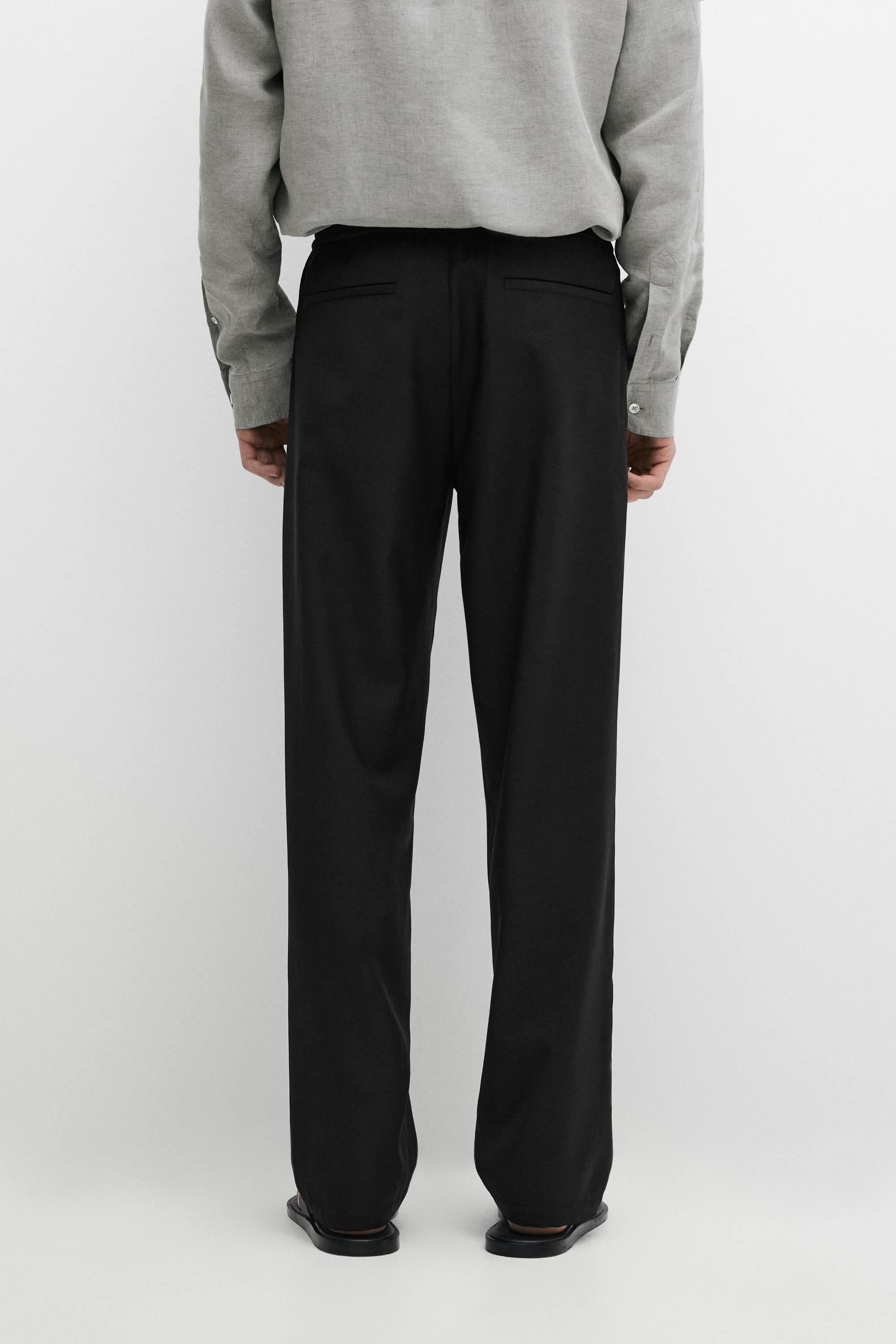Relaxed fit 100% wool trousers — BLACK