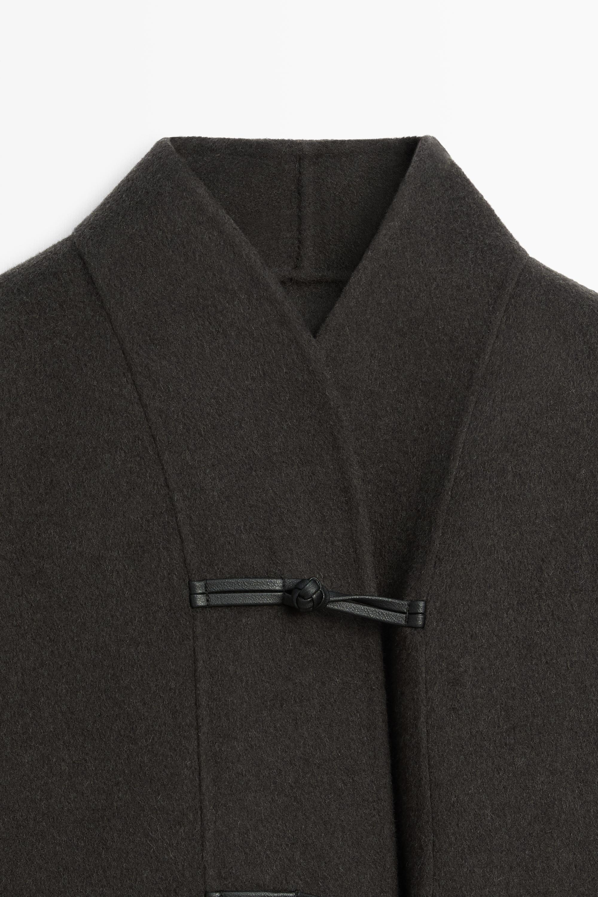 Short wool blend coat with button detail