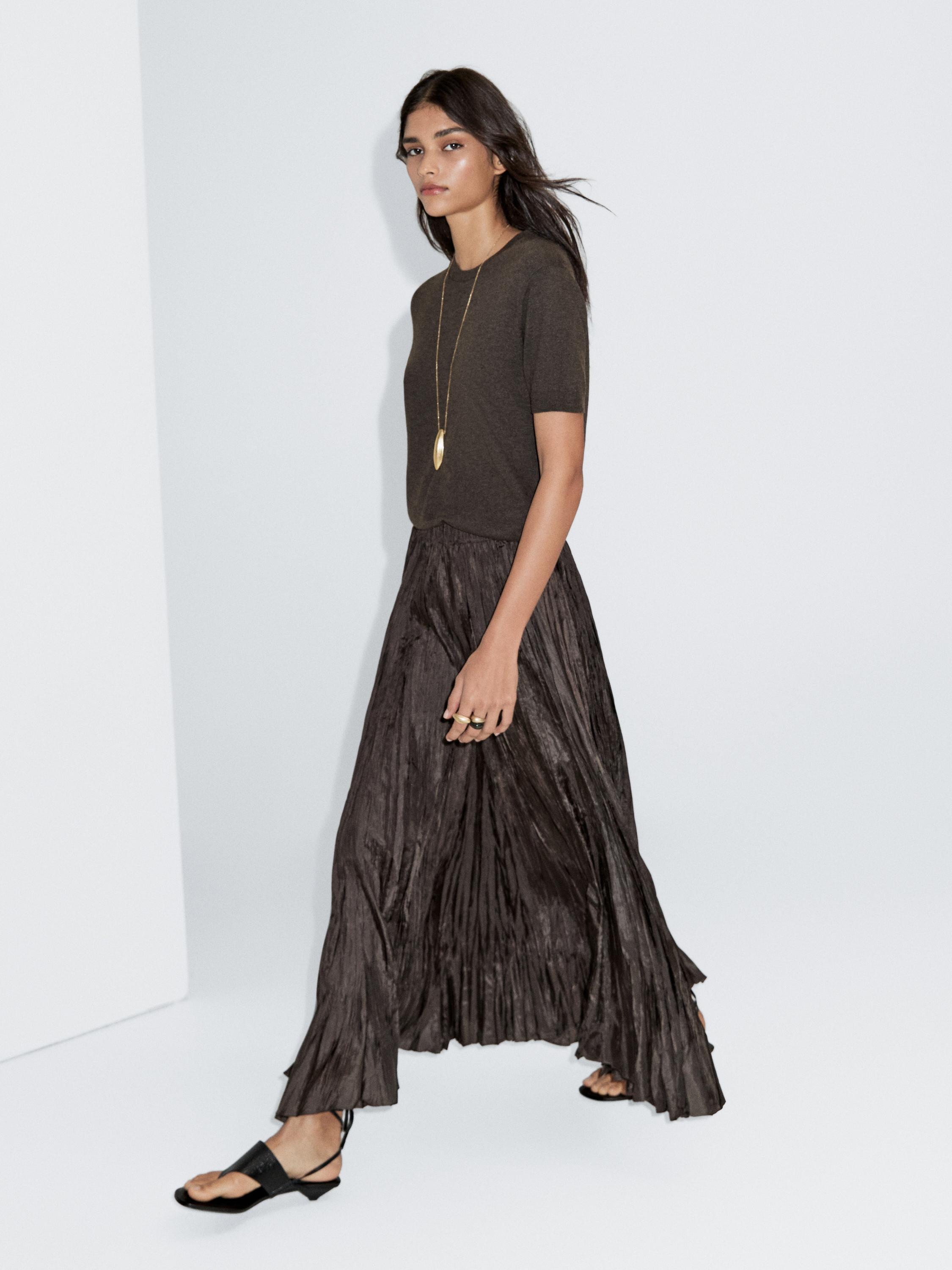Long pleated creased-effect skirt