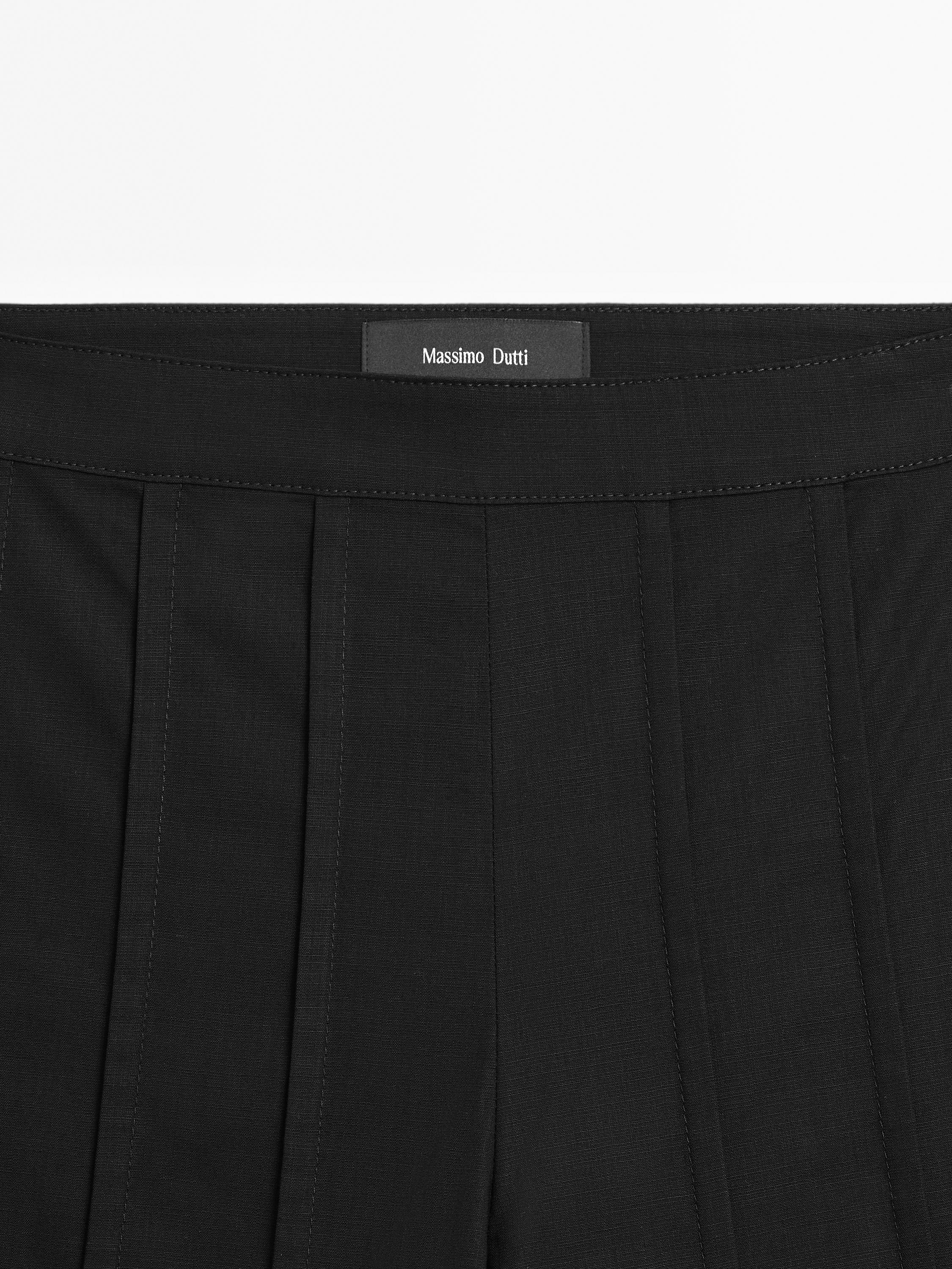 Wide-leg trousers with seam details