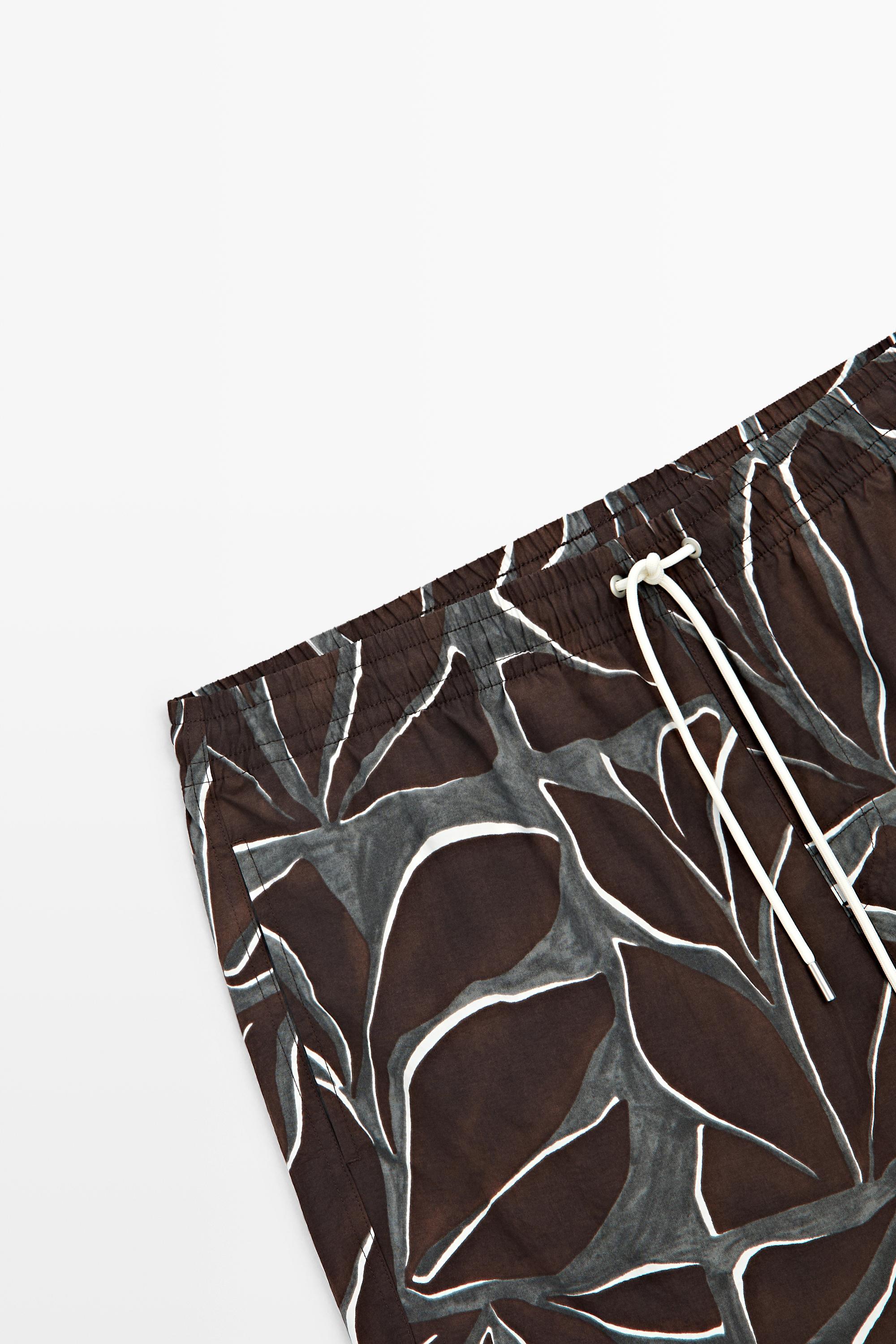 Tropical print swimming trunks — Chocolate