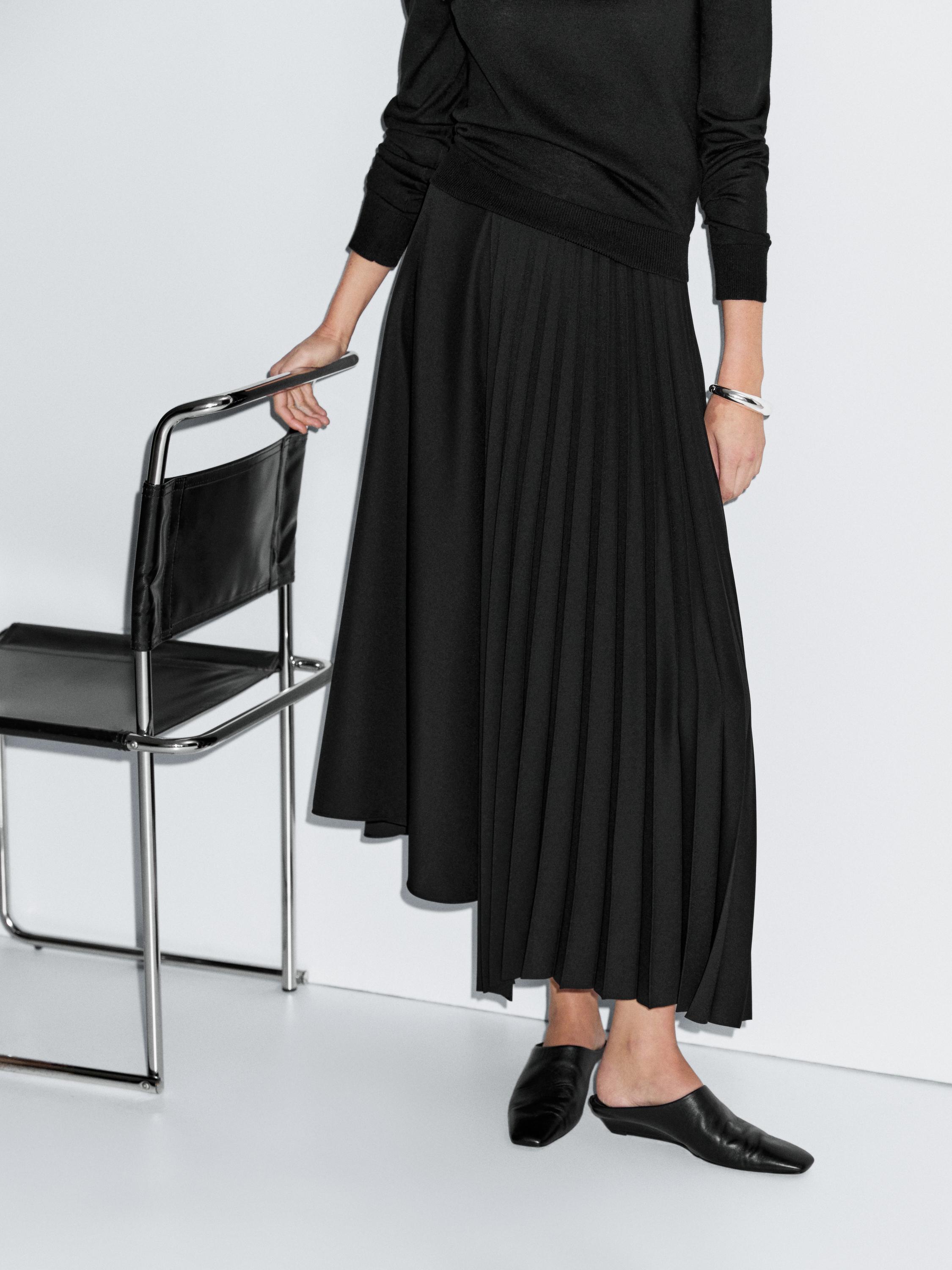 Asymmetric box pleat skirt