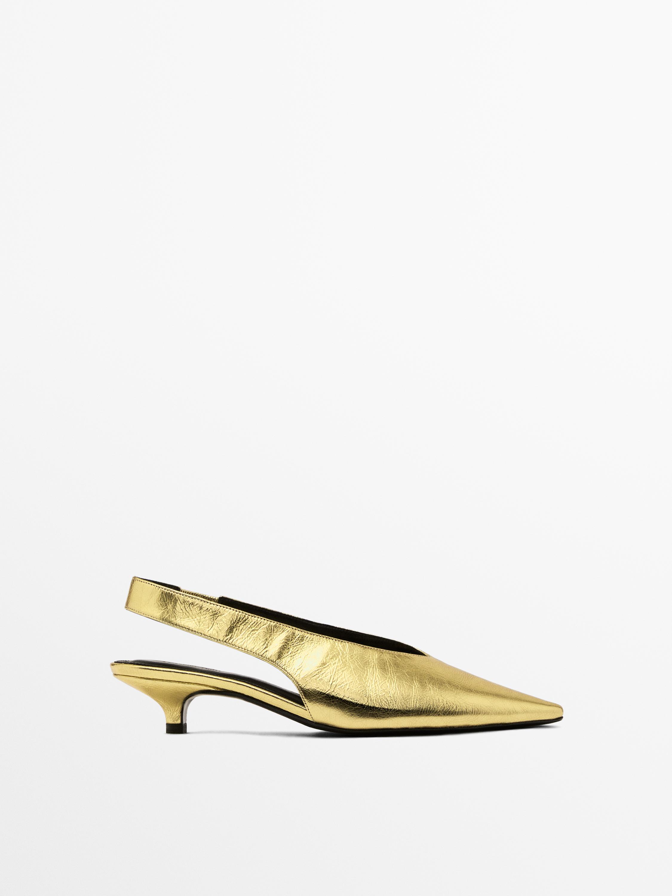 Gold high-heel slingback shoes