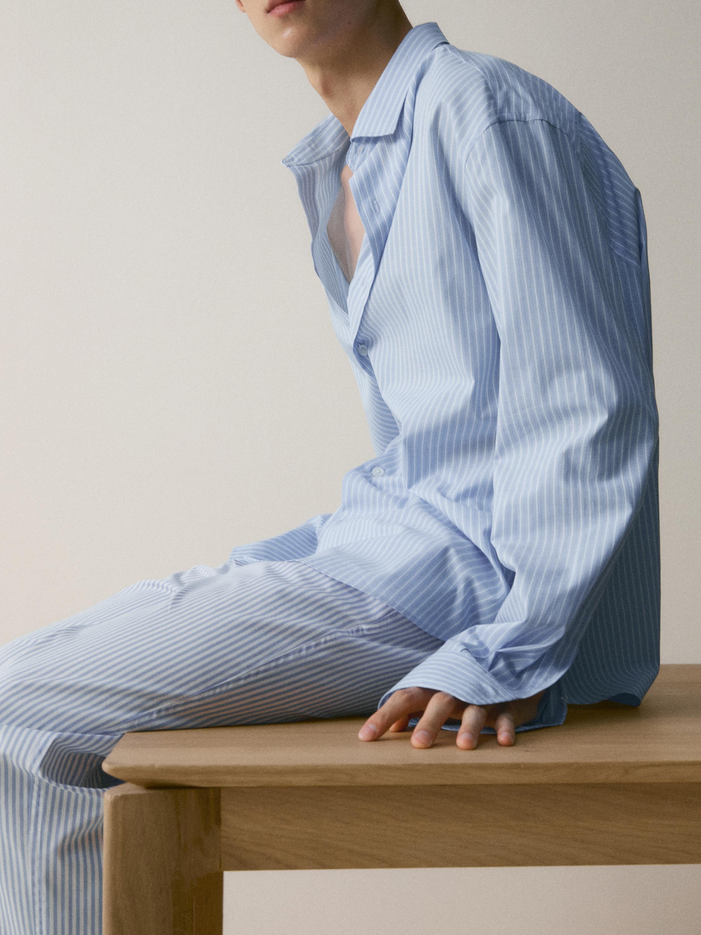 Short sleeve pyjama top and striped trousers