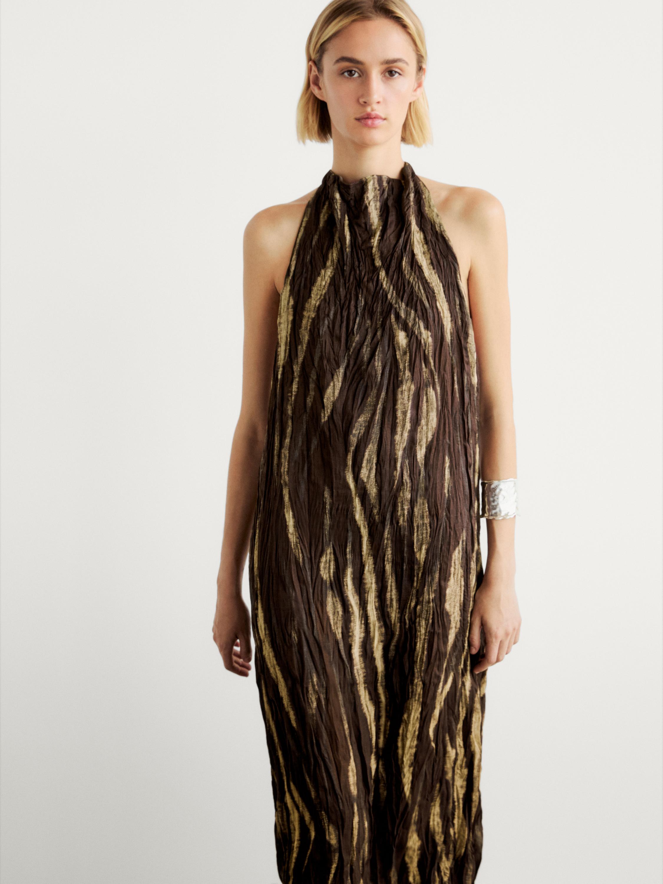 Long creased print halter neck dress