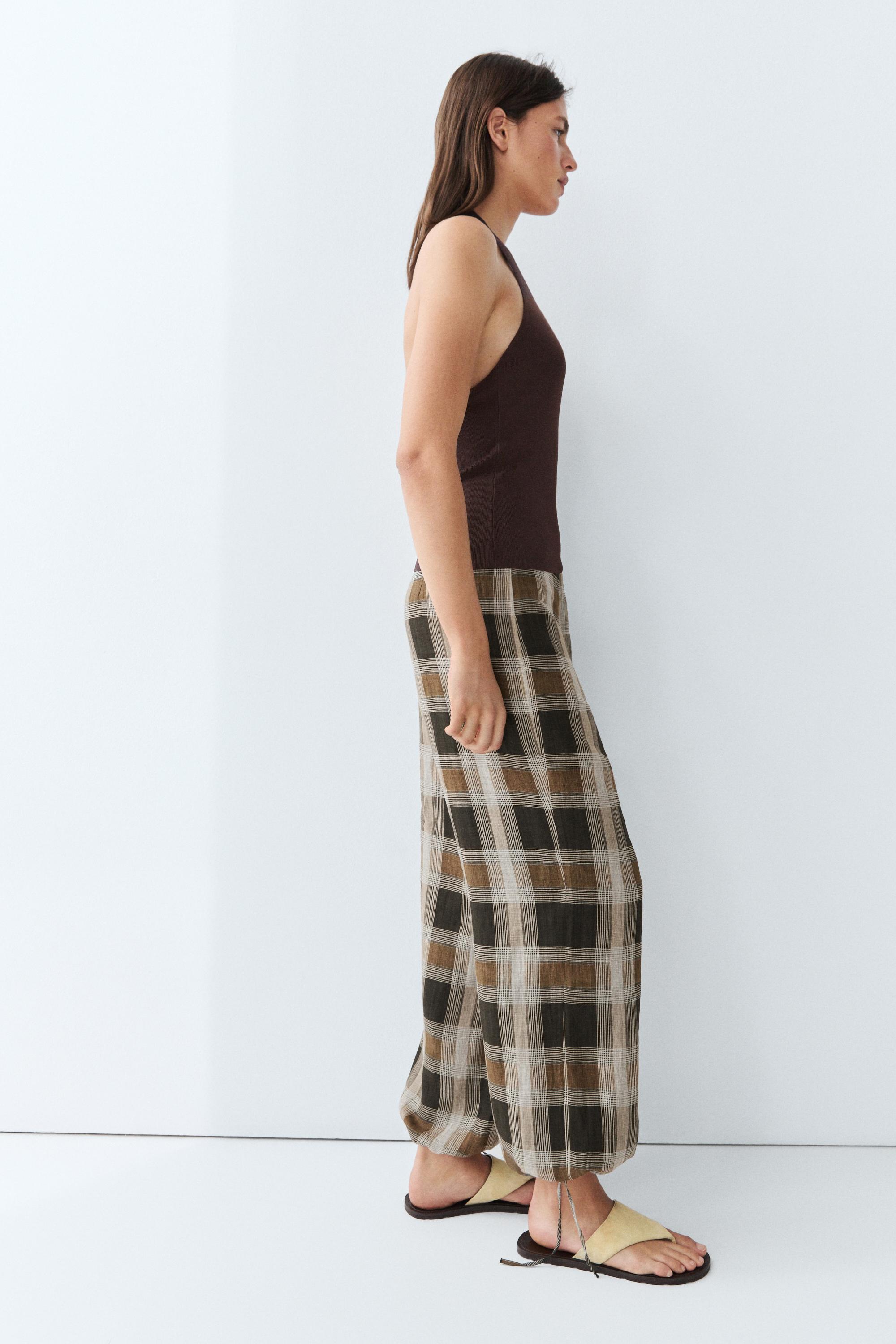 Check print sarouel trousers — BLACK