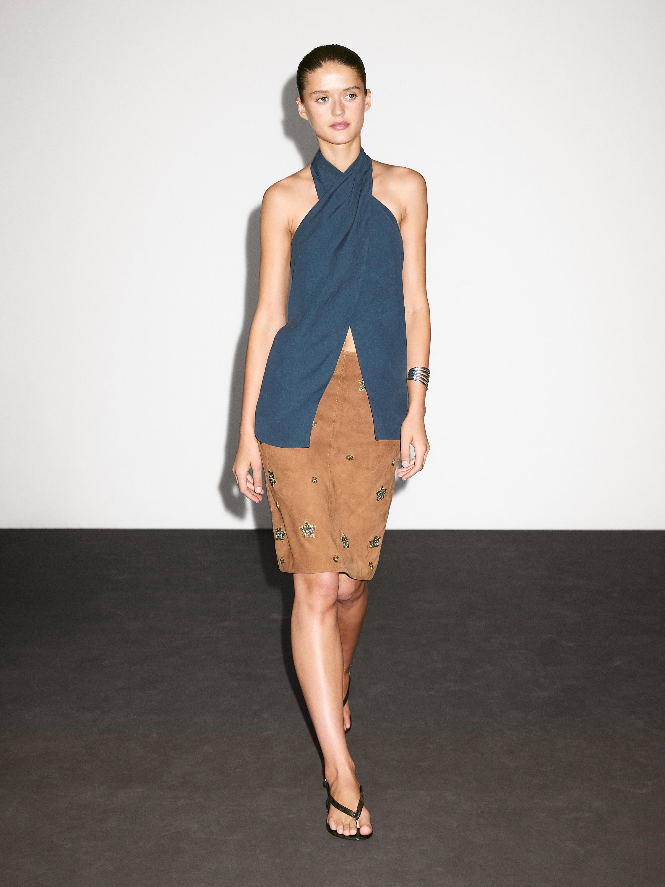 Suede leather skirt with rhinestone detail