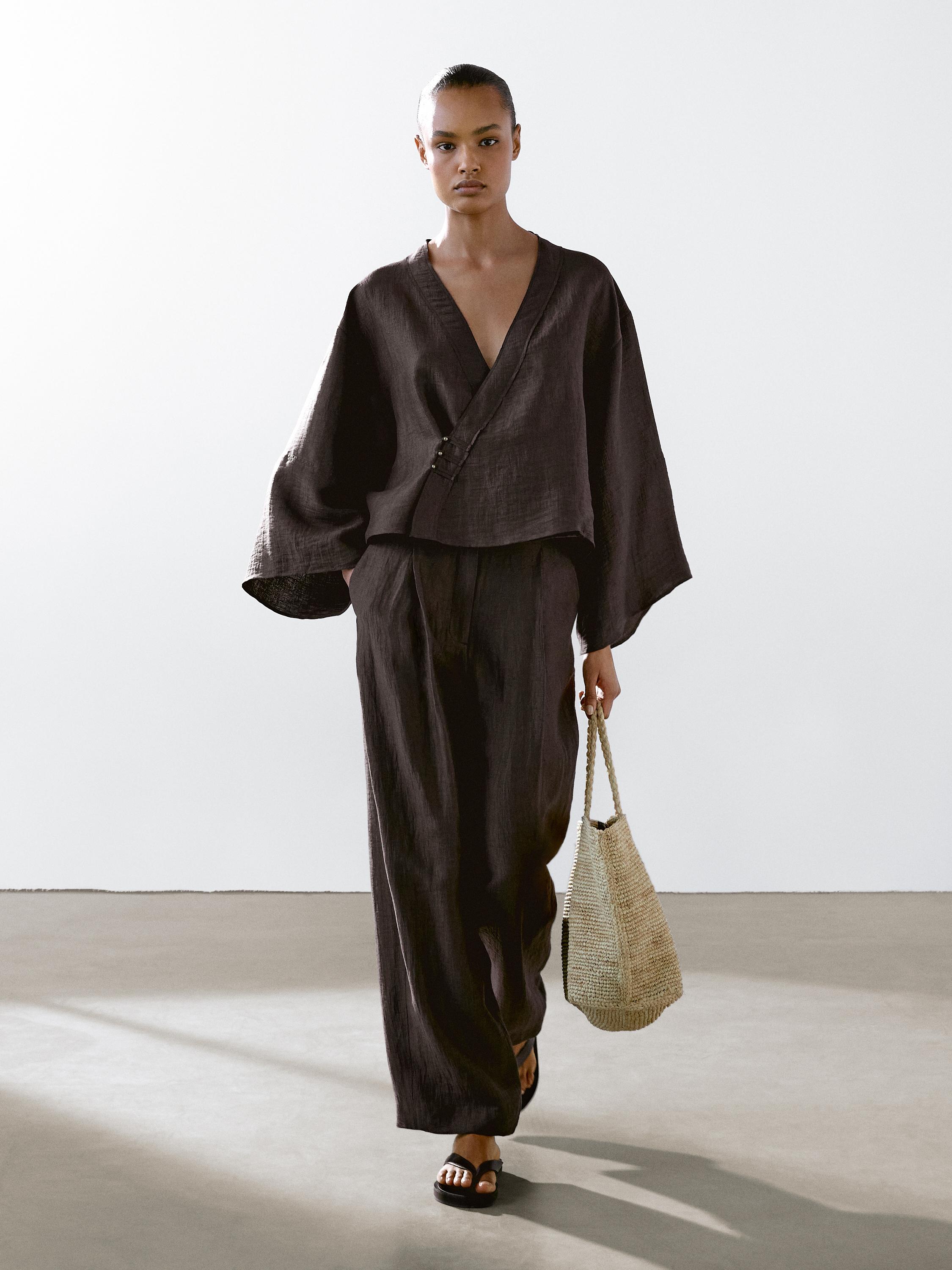 Flowing linen blend trousers with darts