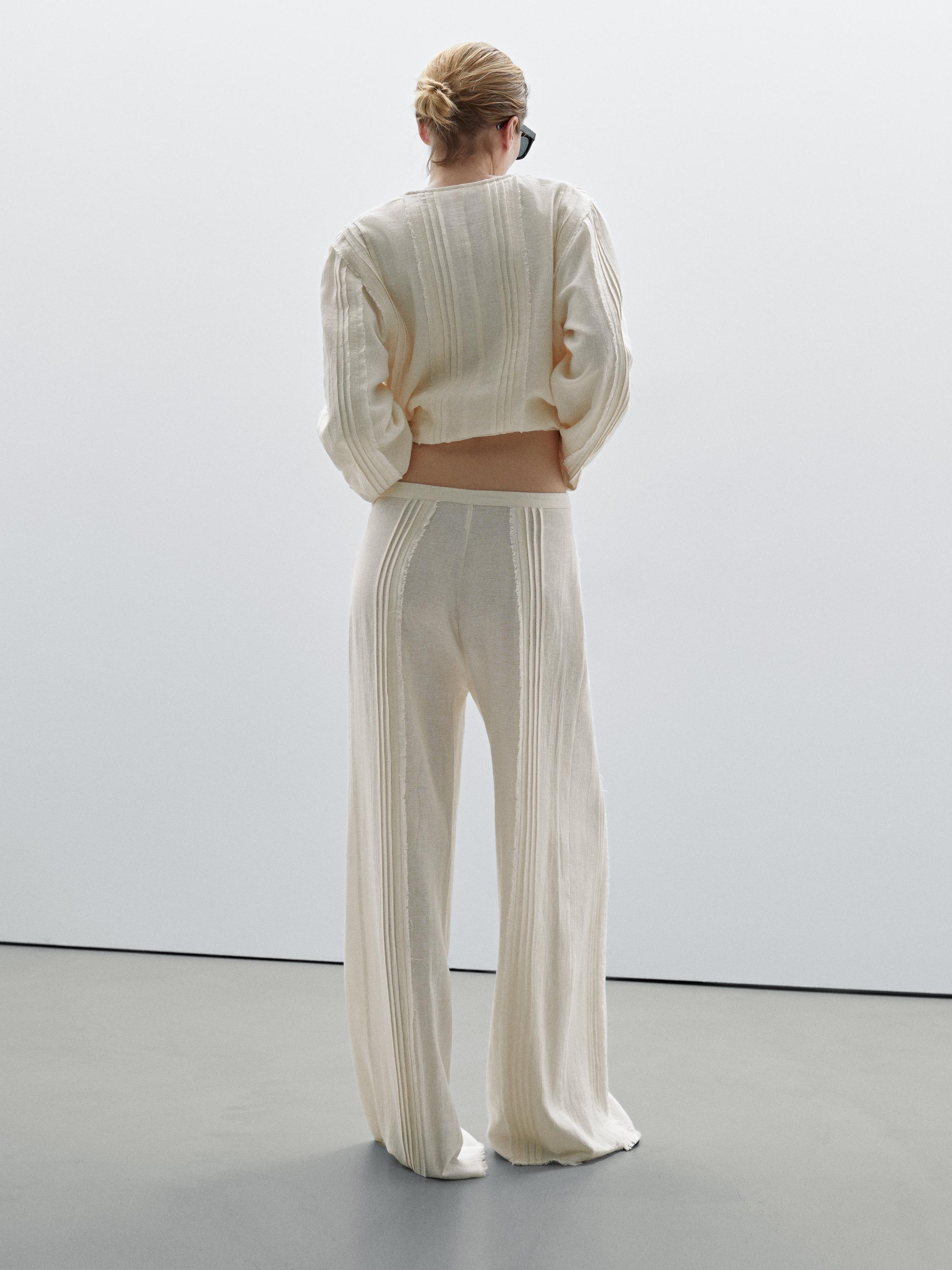Cotton blend trousers with embroidered details