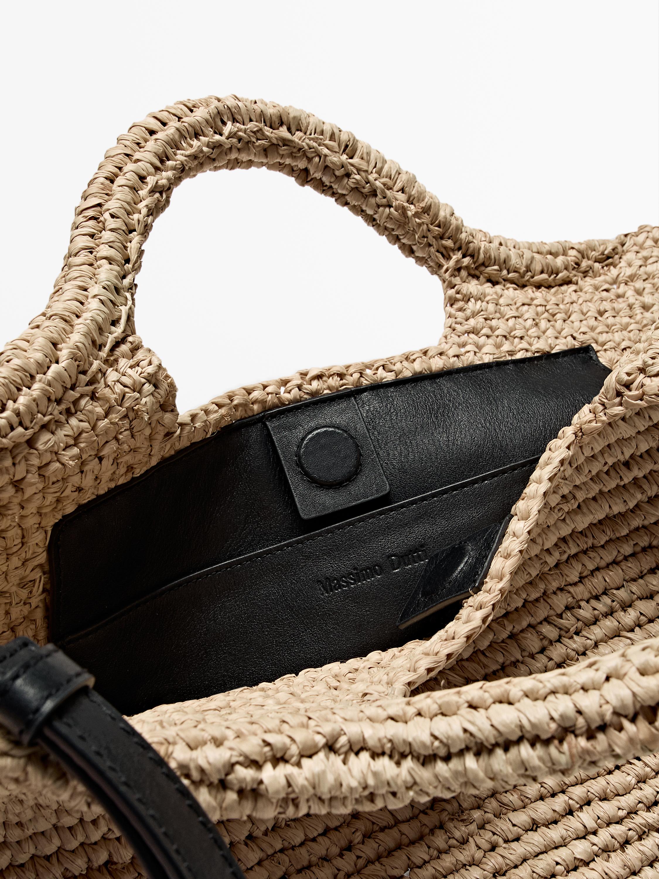 Natural raffia bag with leather base