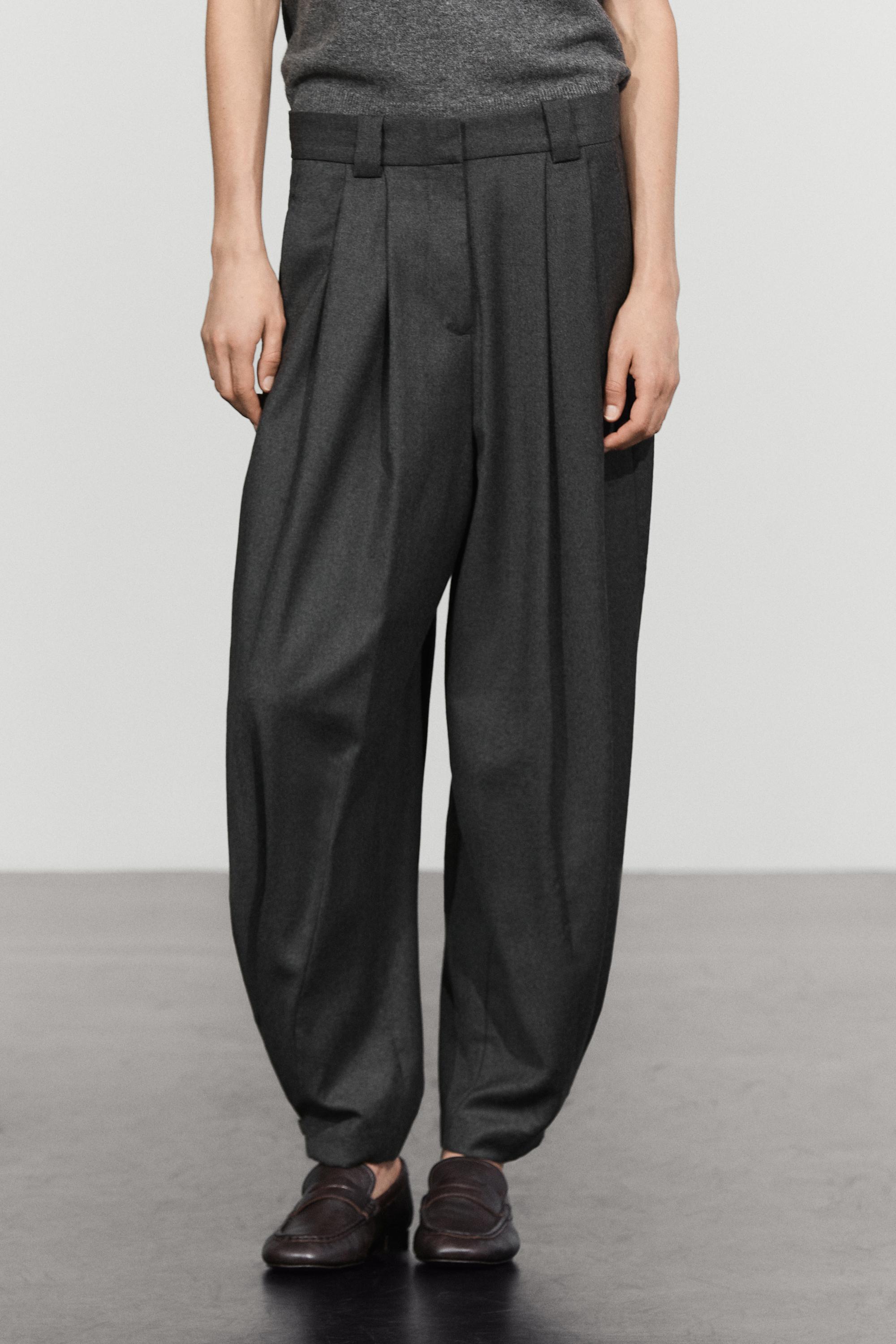Flanellhose mit Bundfalten und Saumdetail