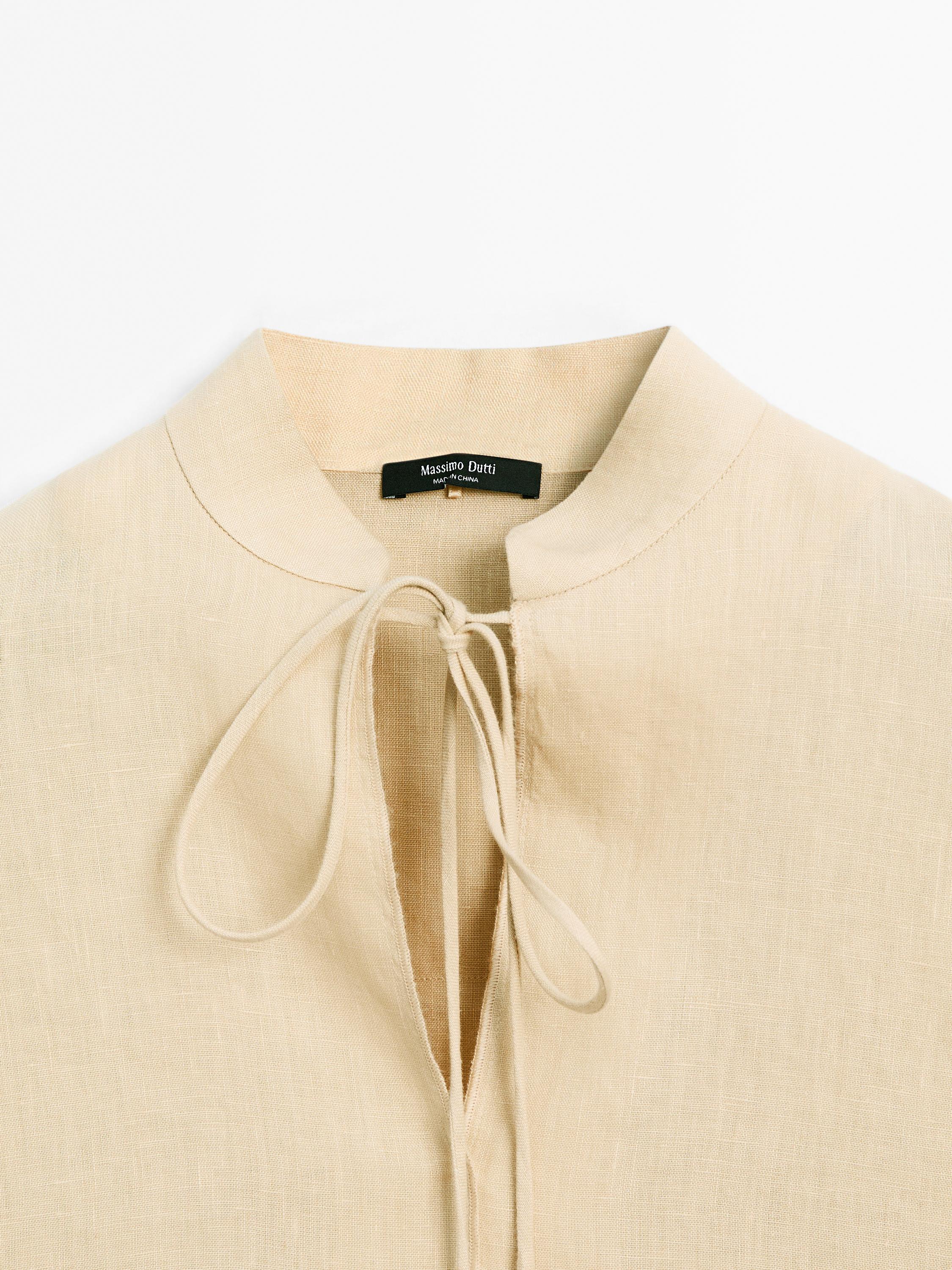 Flowing shirt with rhinestone cord detail