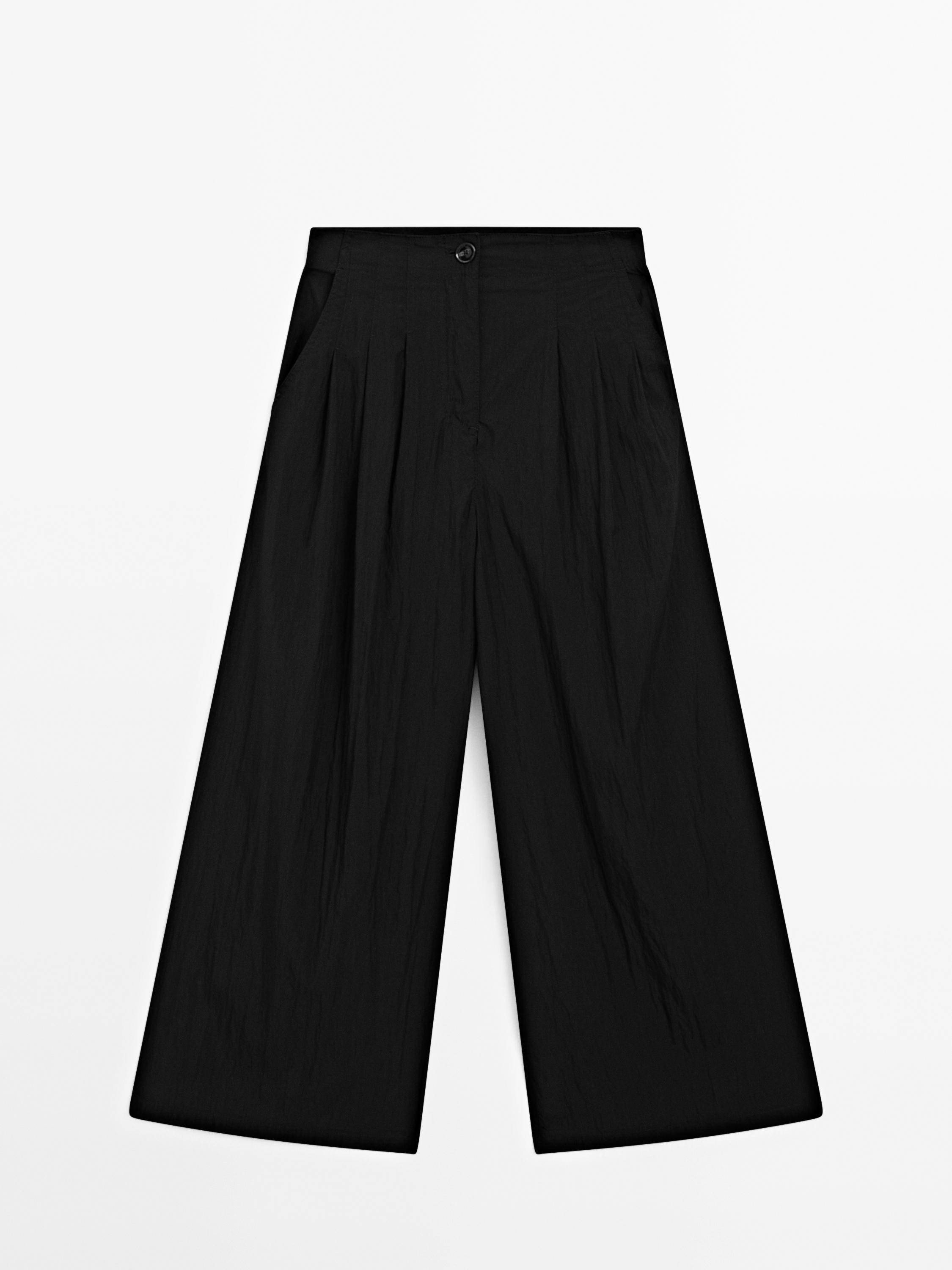 Pantalón palazzo fluido detalle pinzas