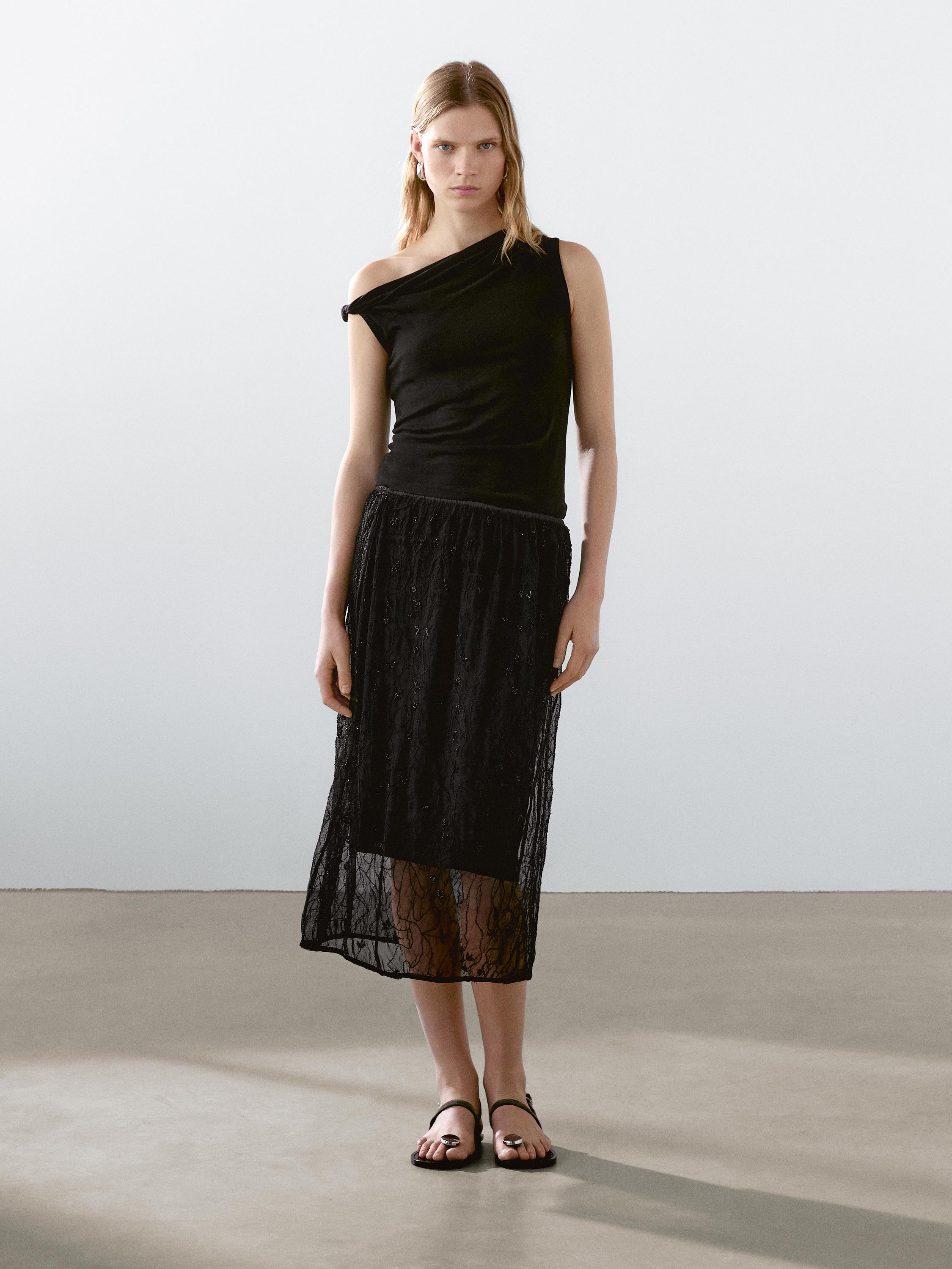 Halbtransparenter Midirock mit Strass