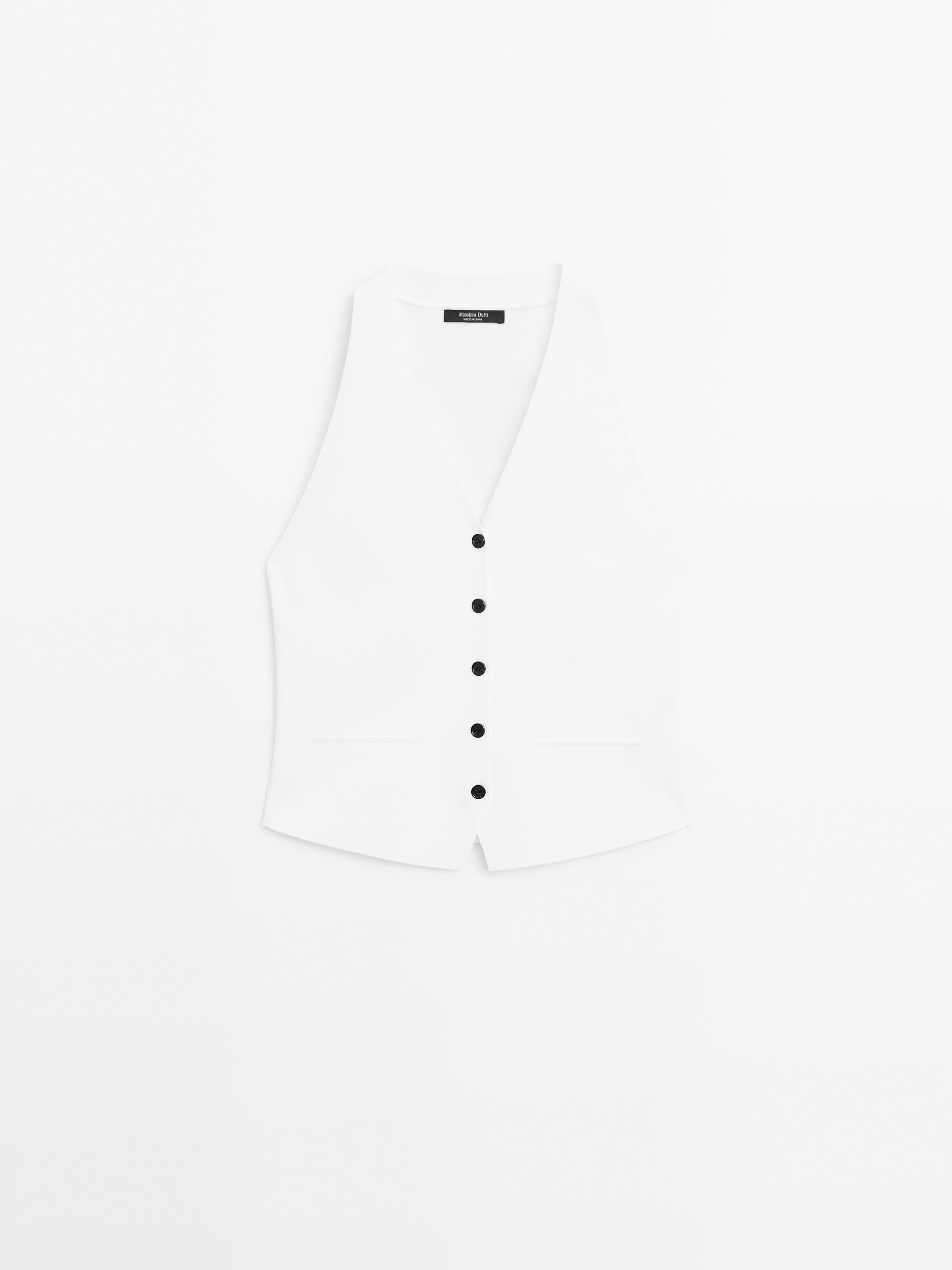 Knit waistcoat with contrast buttons