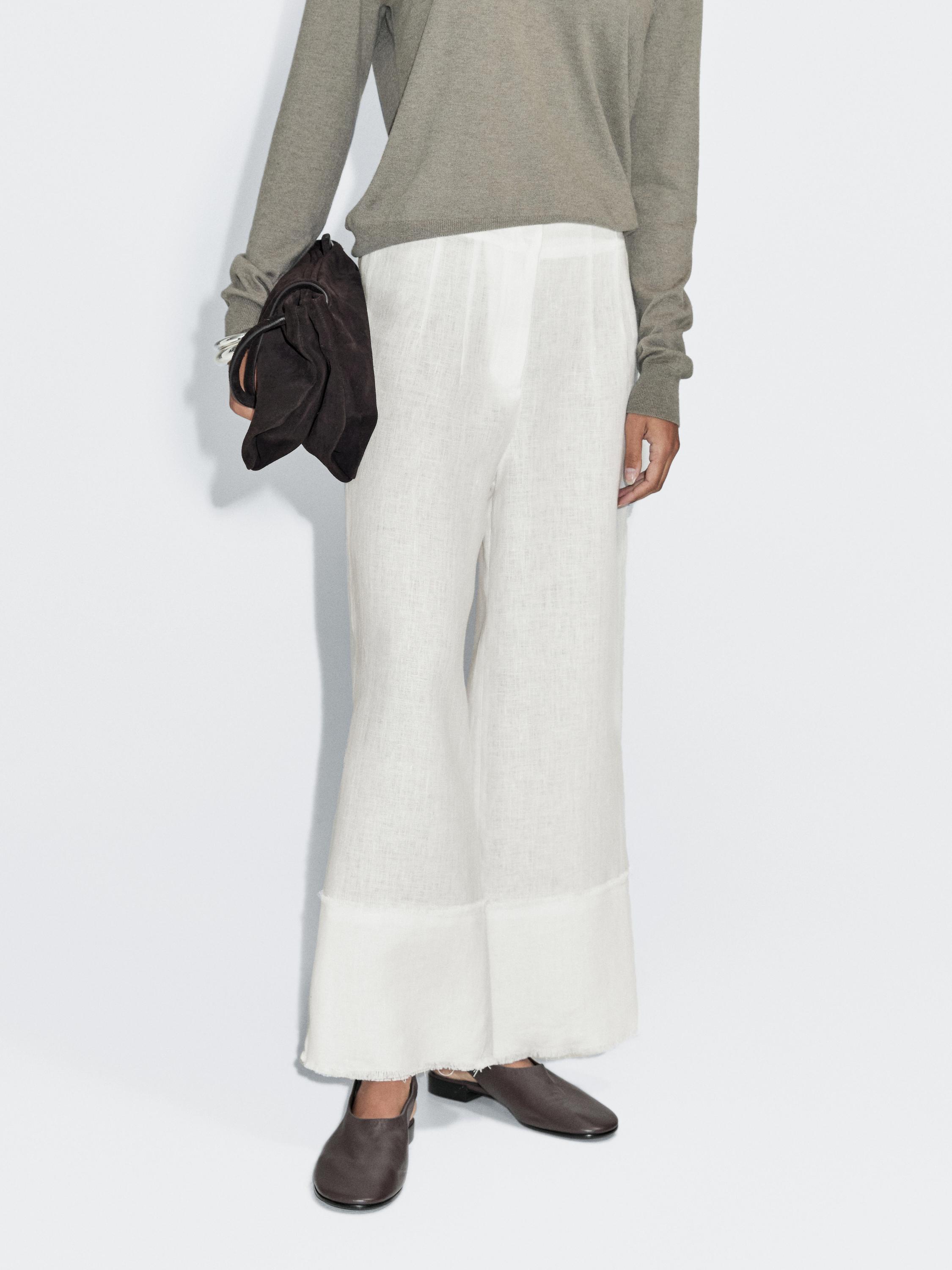 Linen trousers with frayed detail