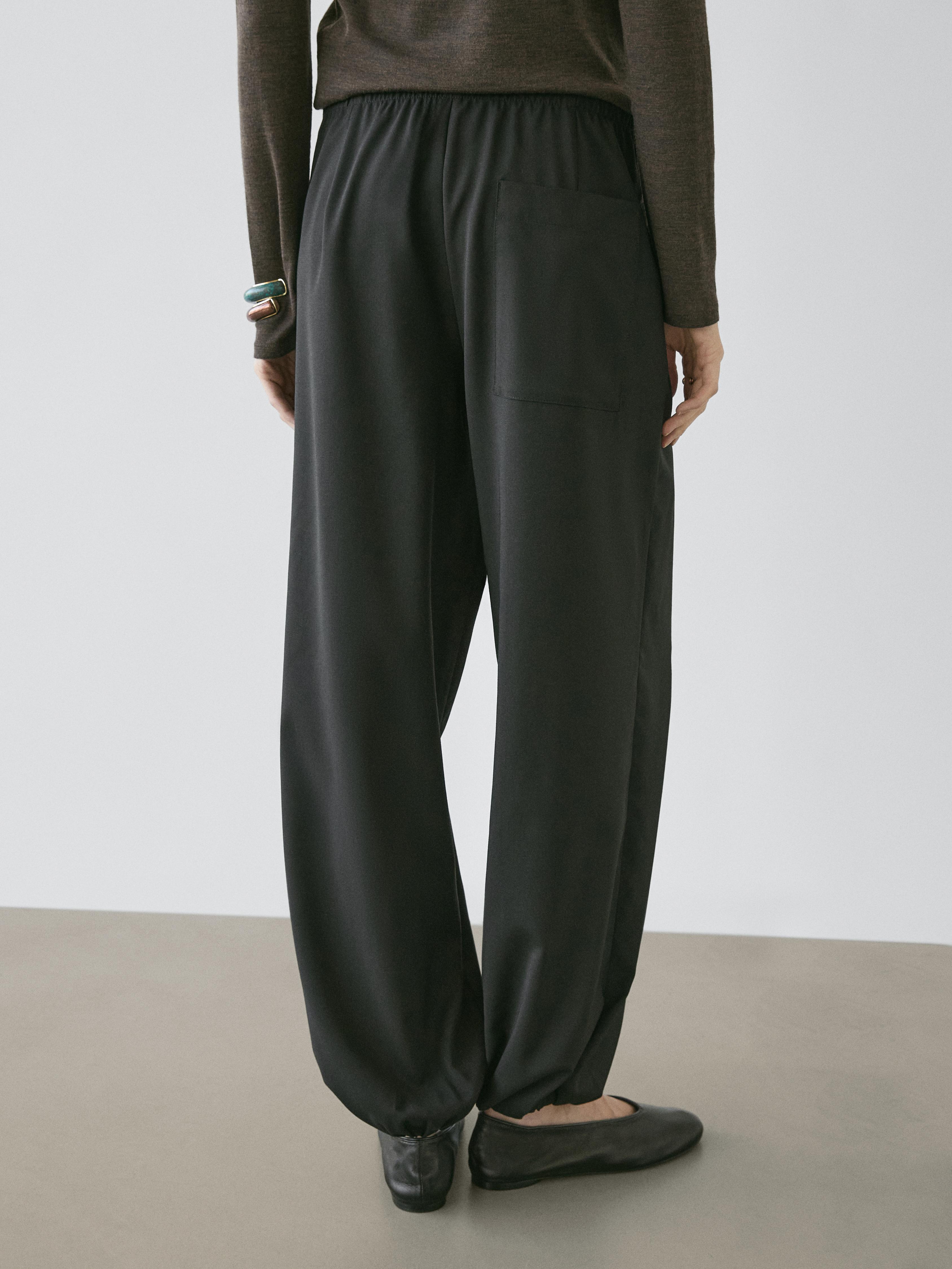 Wool sarouel trousers with tie detail — BLACK
