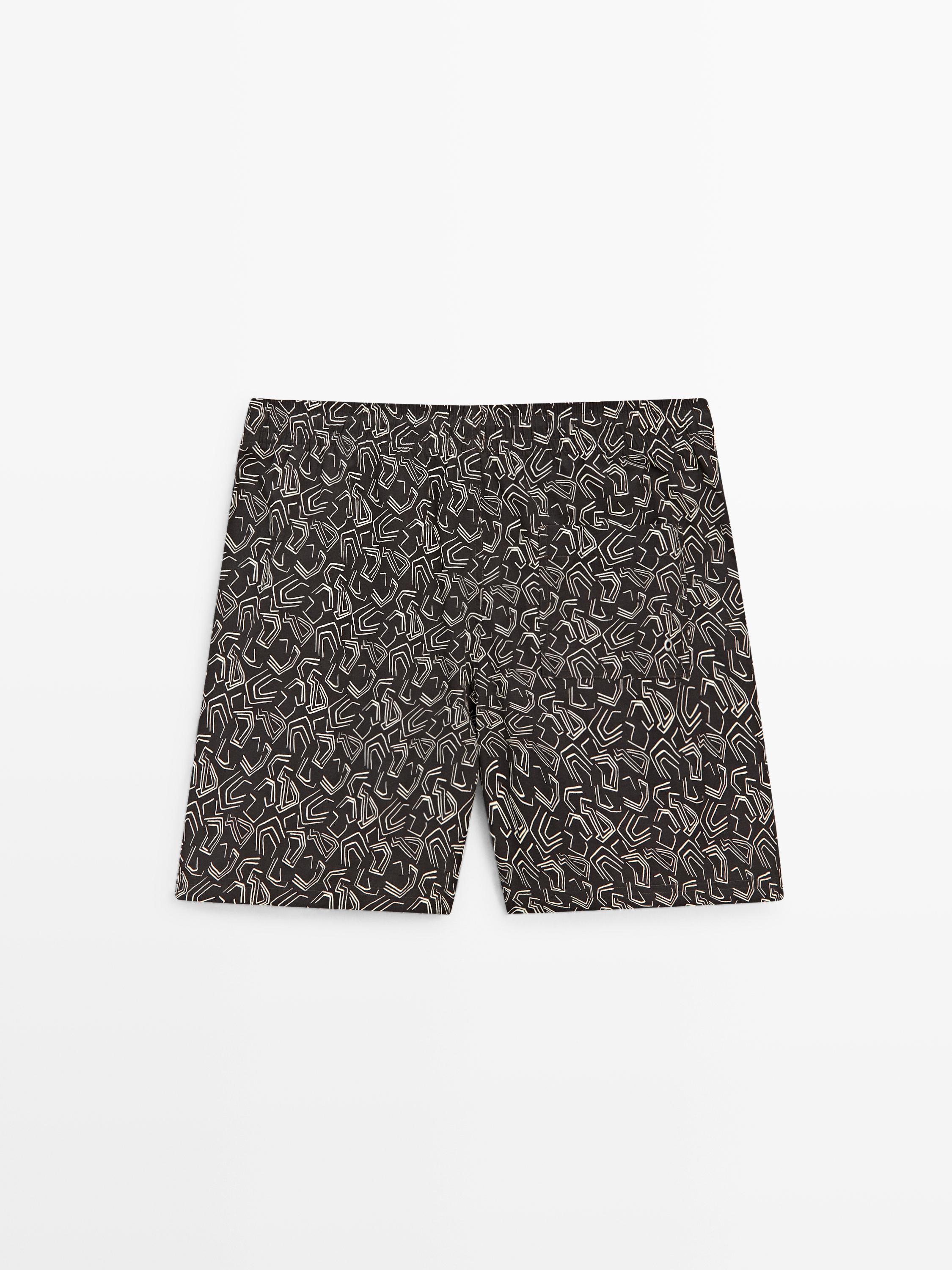 Soyut detaylı deniz şortu