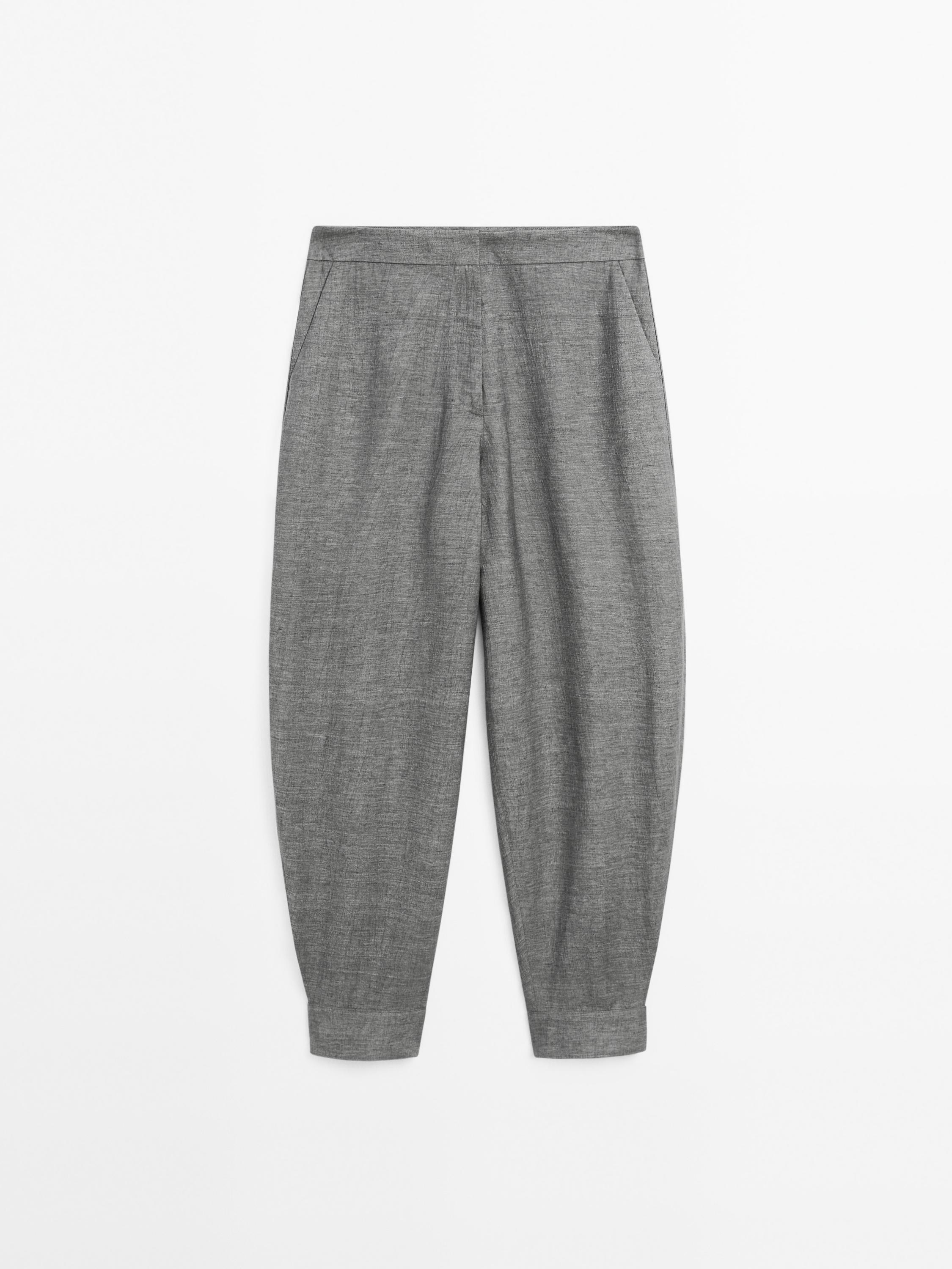 Pantalón bombacho detalle botones