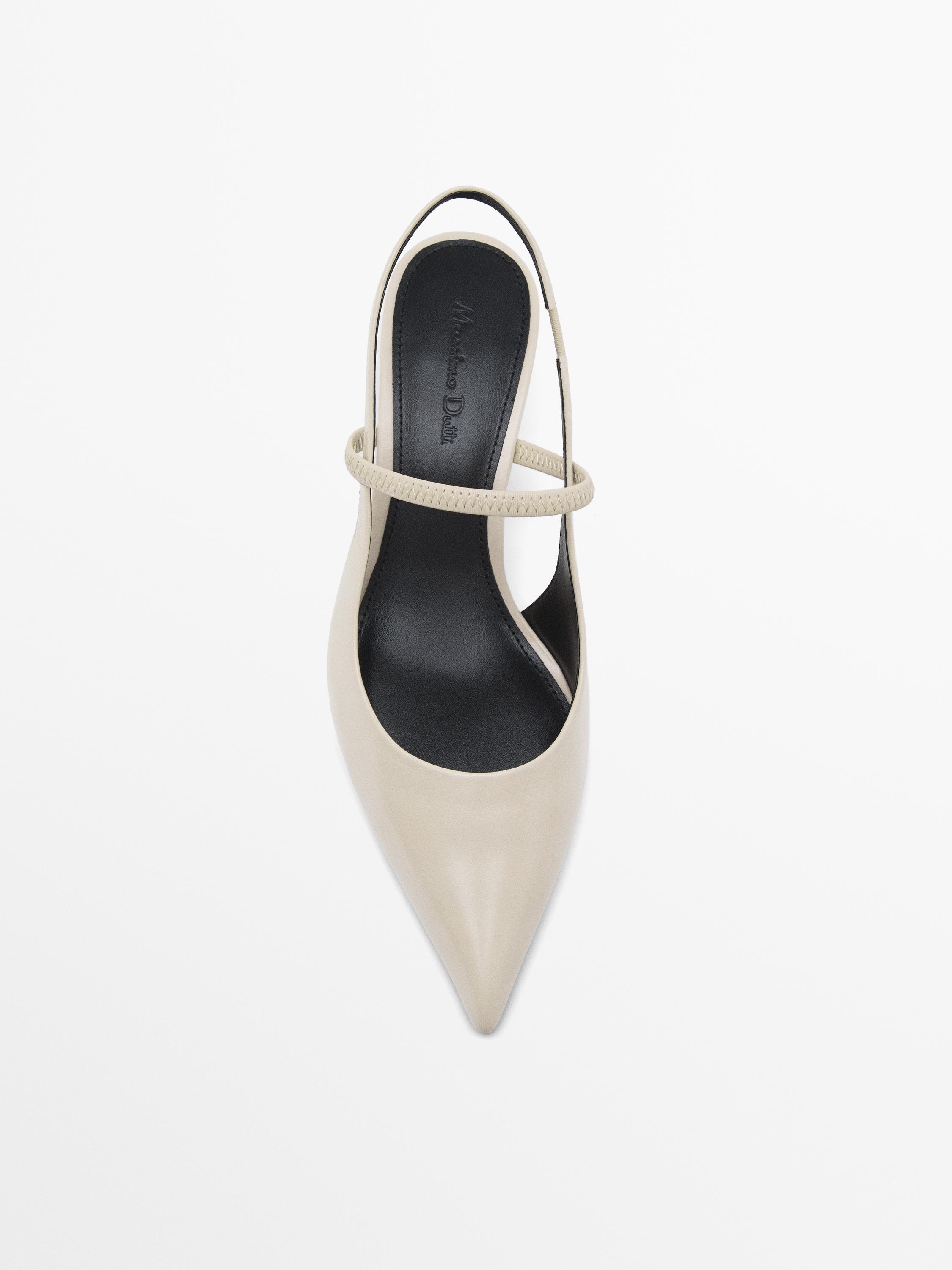 Mules à talon avec élastique sur l’empeigne