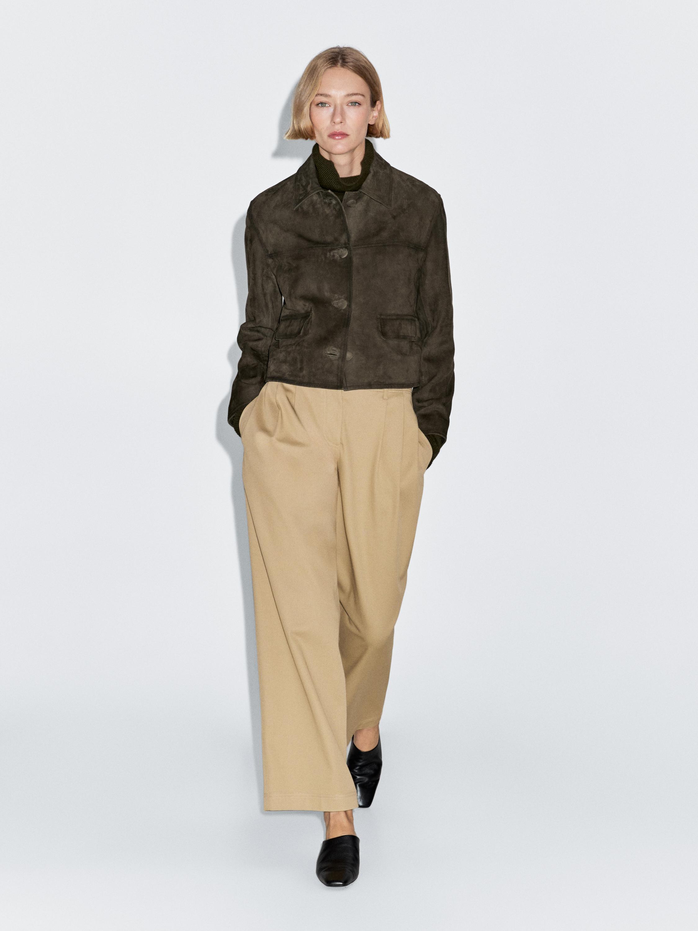 جاكيت جلد شامواه بأزرار مبطنة