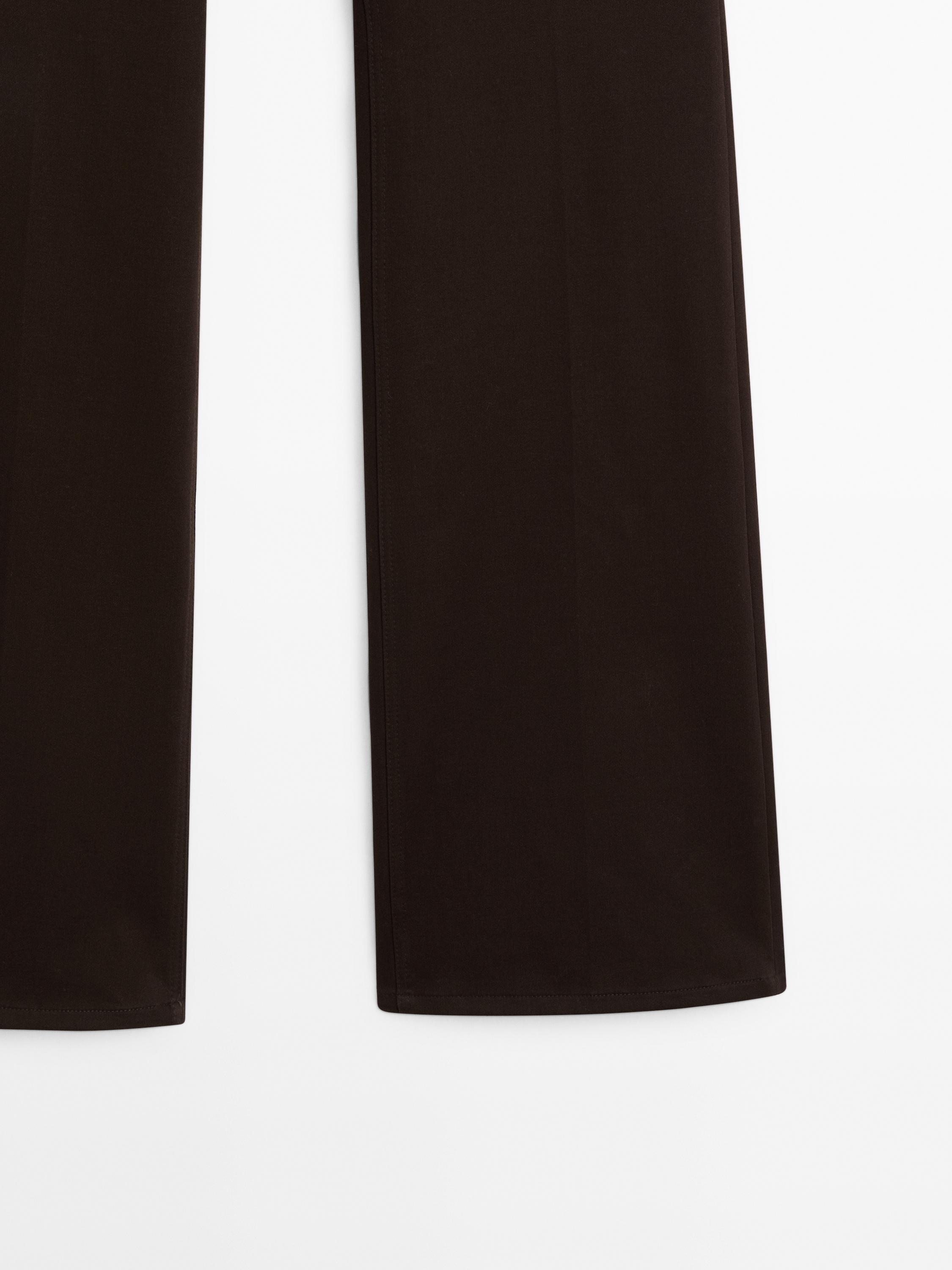 Low-rise slim fit flared trousers