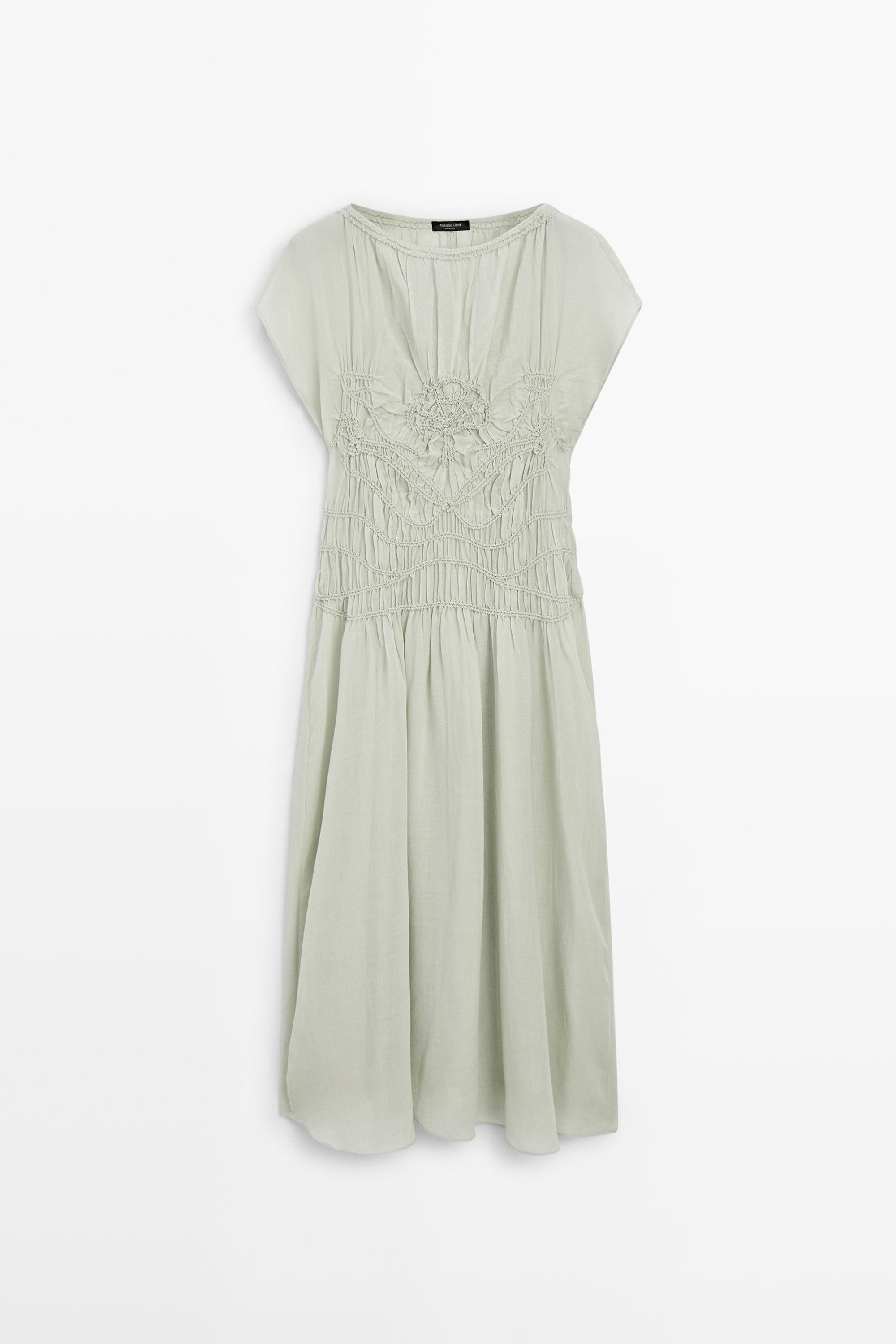 Long flowing dress with embroidered details