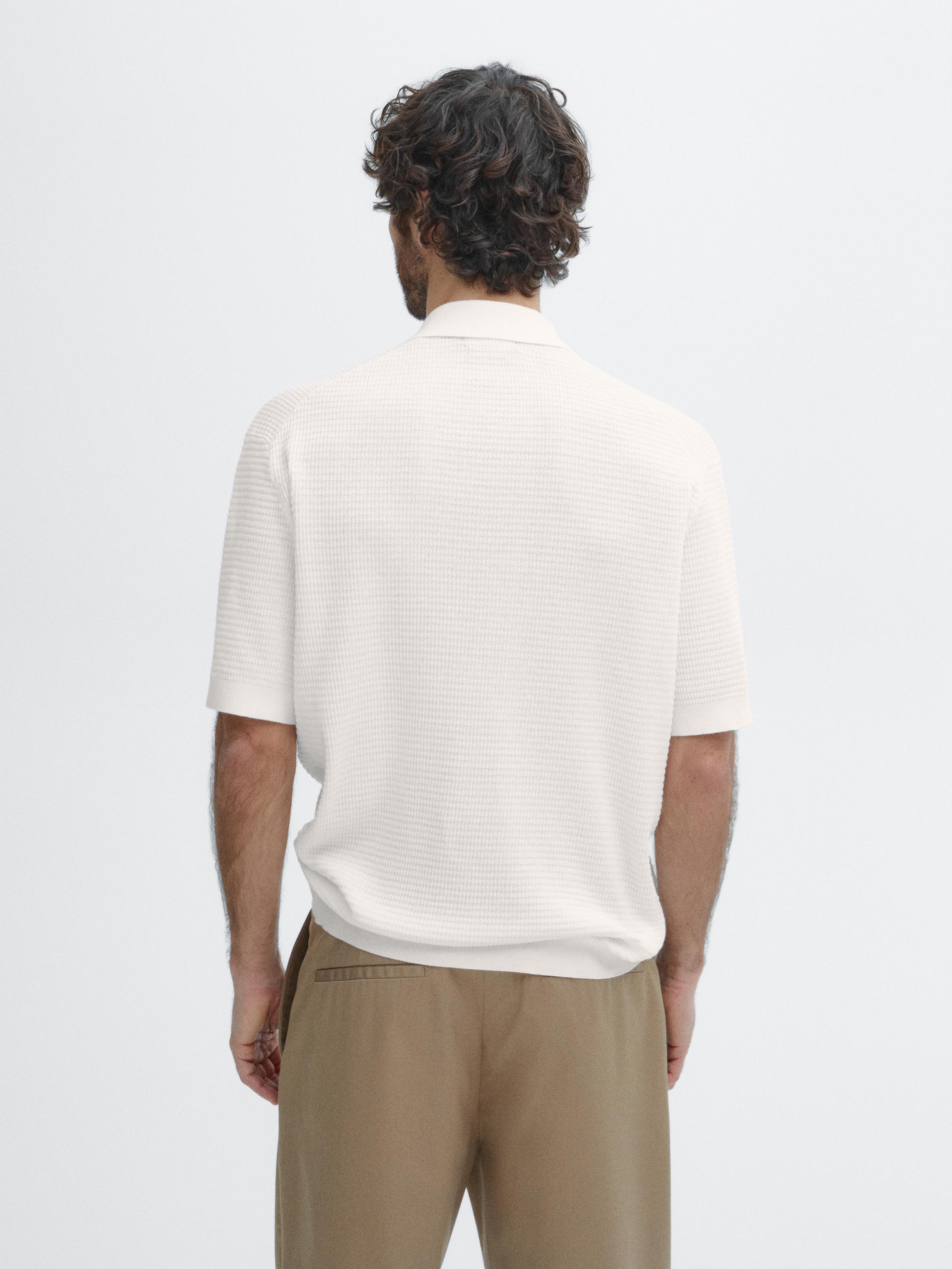 Pull polo col en V manches courtes