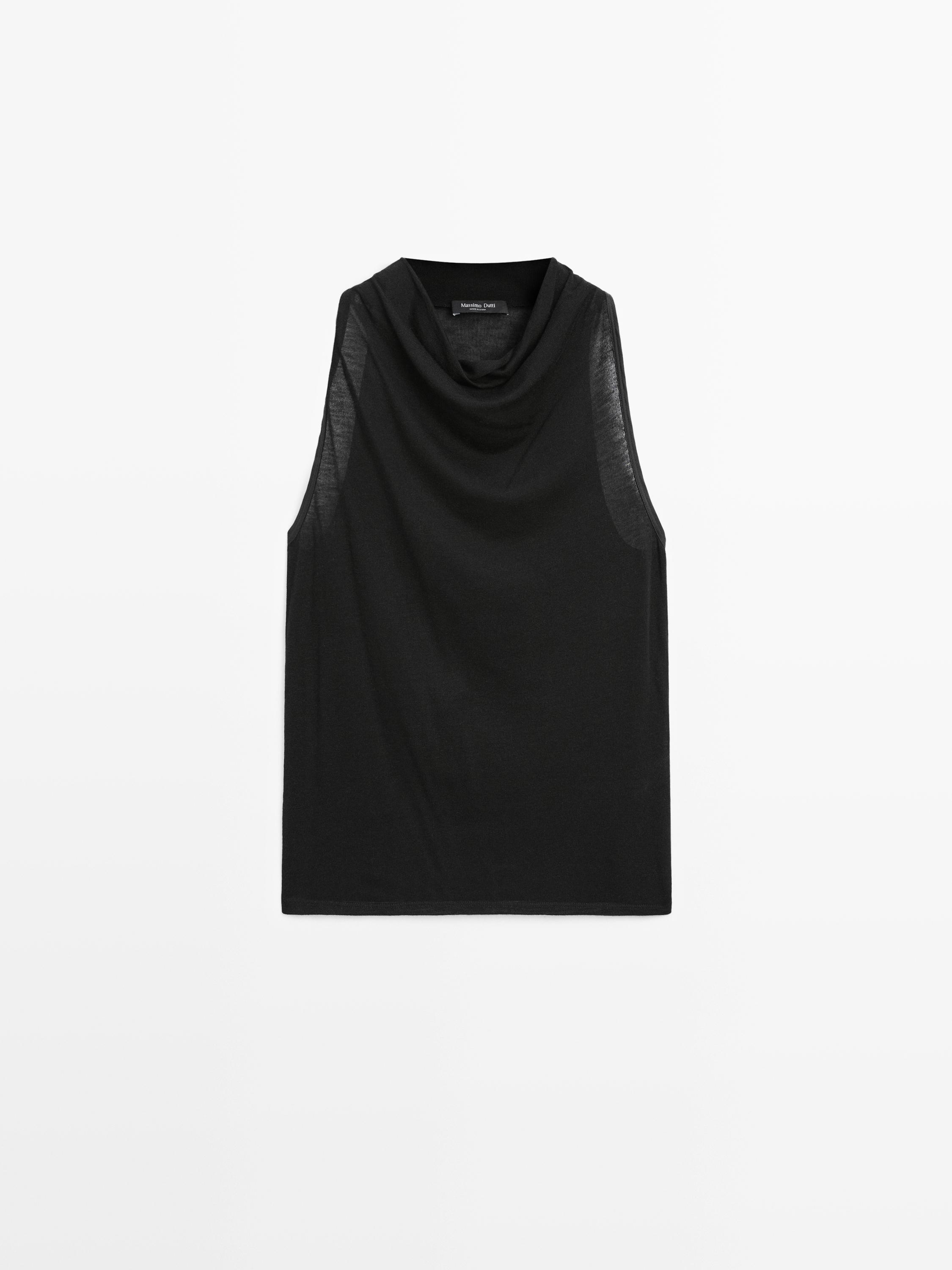 Sleeveless top with draped neckline
