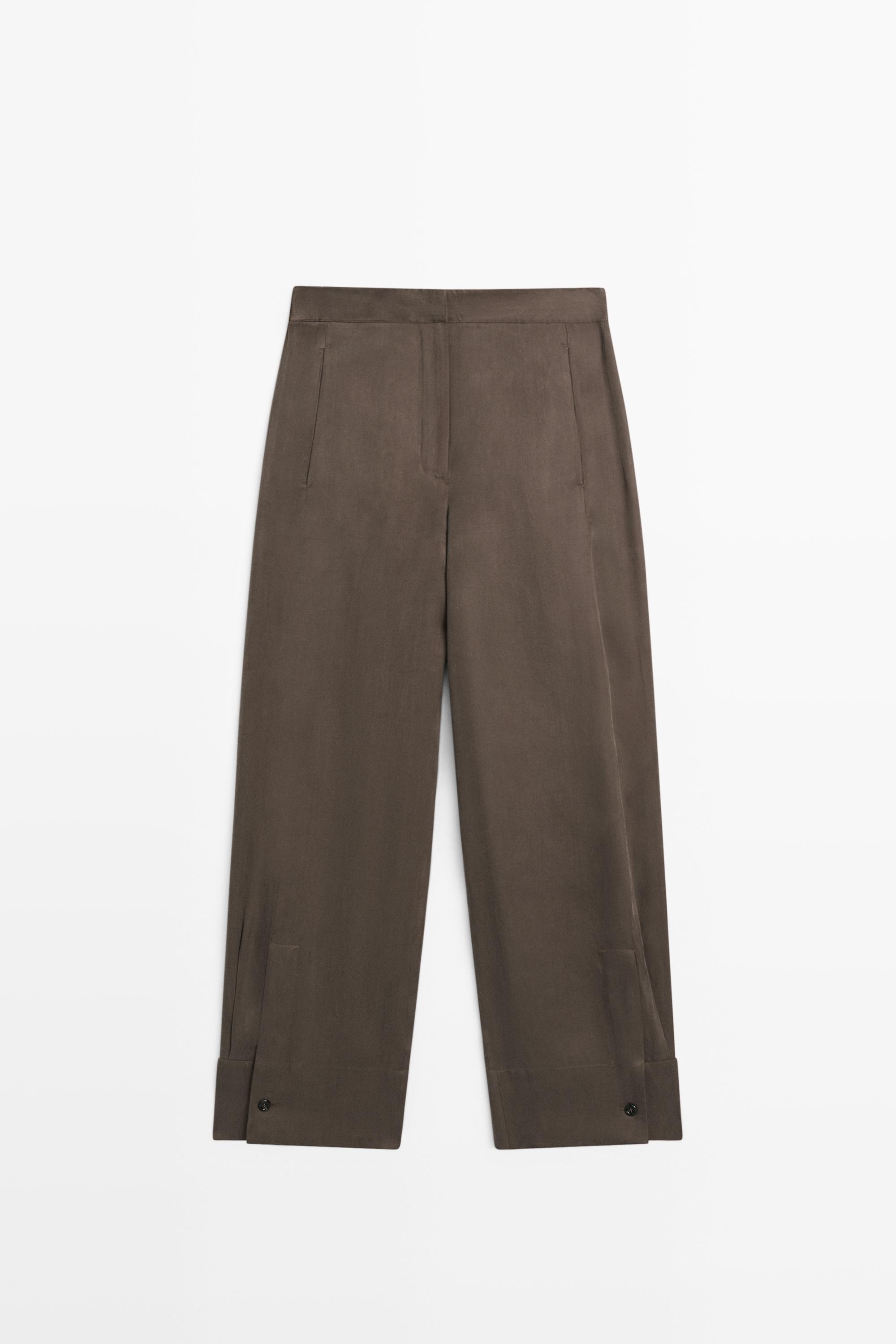 Total look flowing trousers with buttoned hems — PLUM