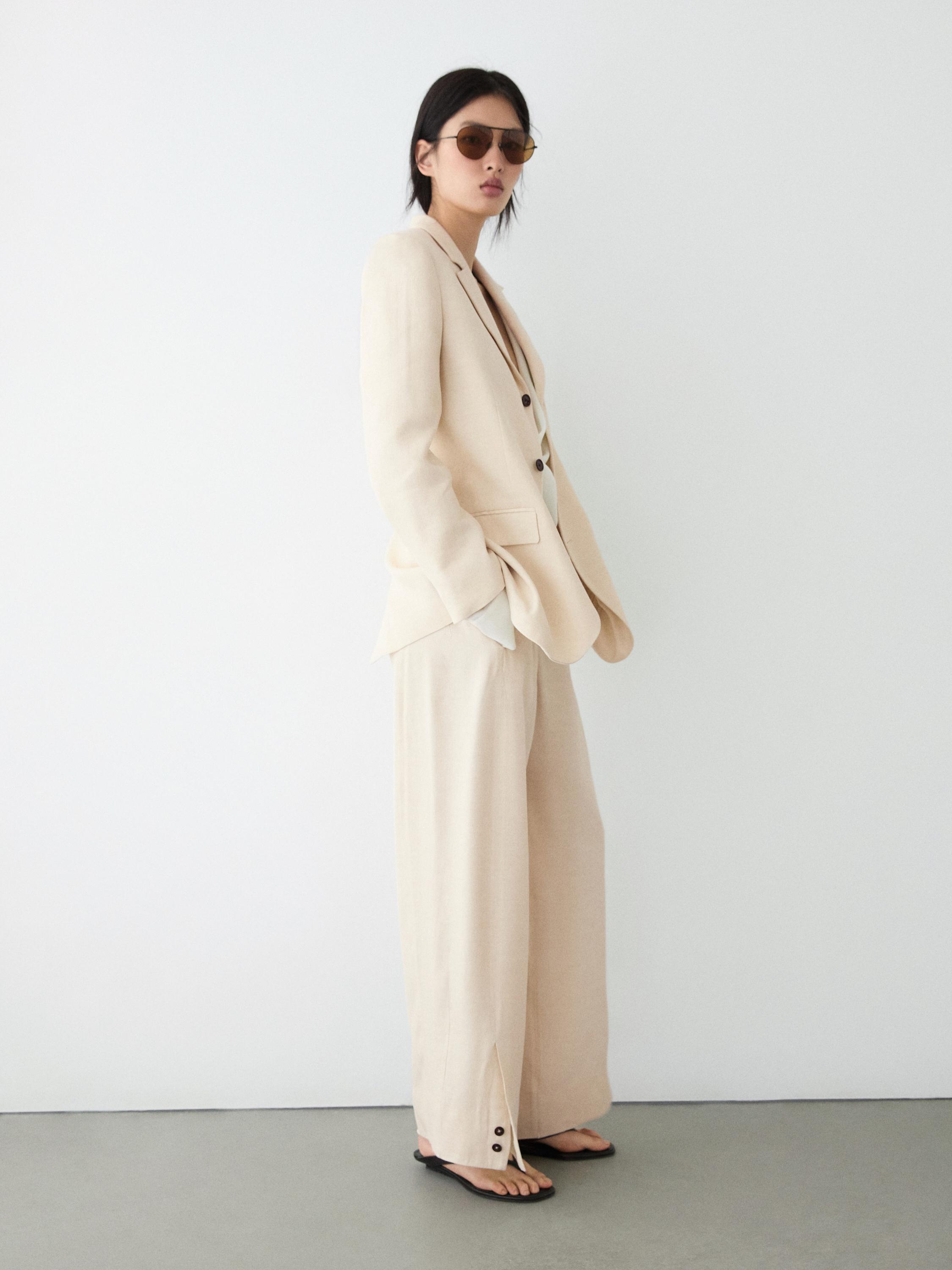 Linen blend suit trousers with button detail — CREAM