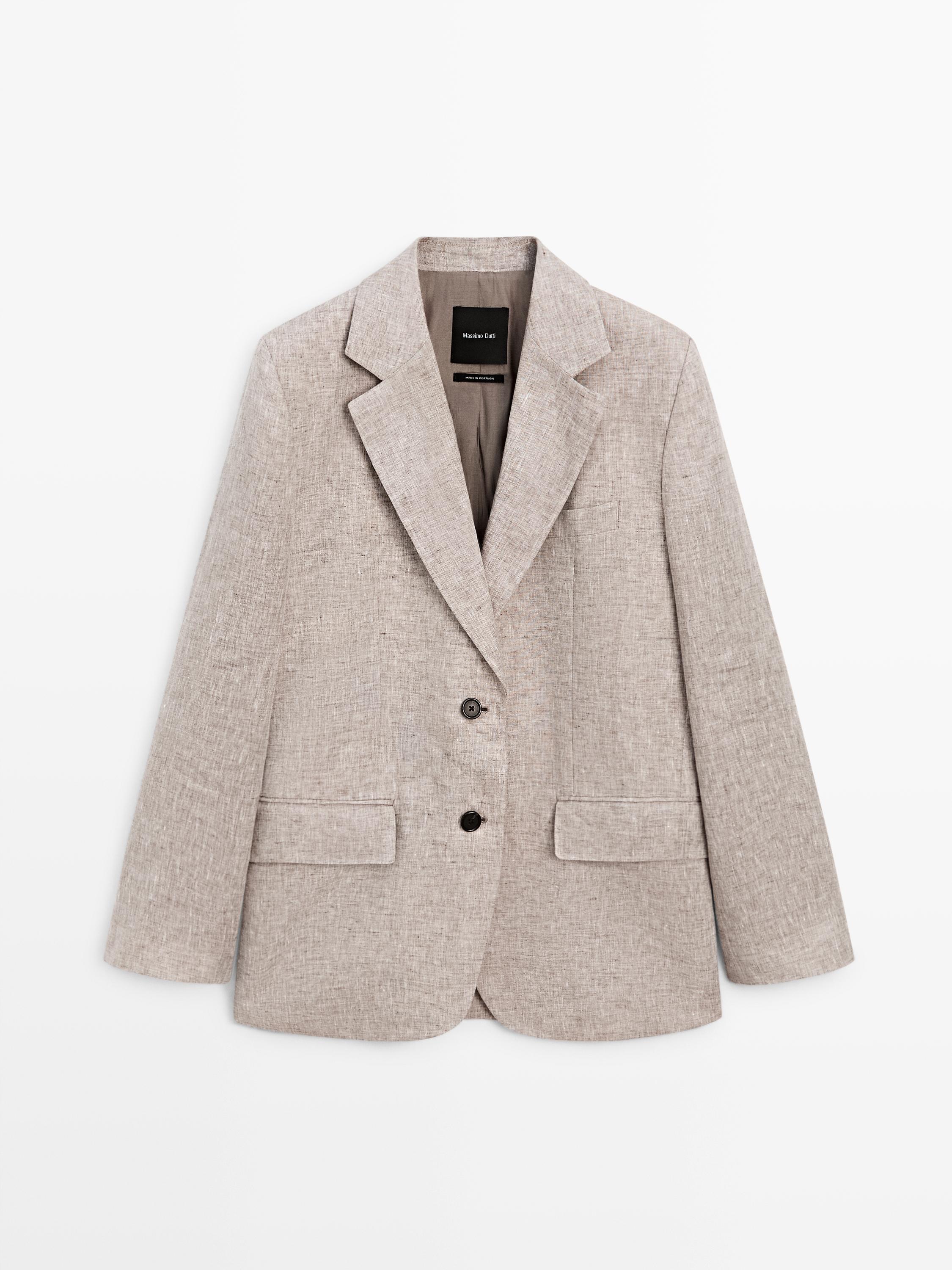 Front view of a beige blazer with notch lapels, two dark buttons, and front flap pockets.